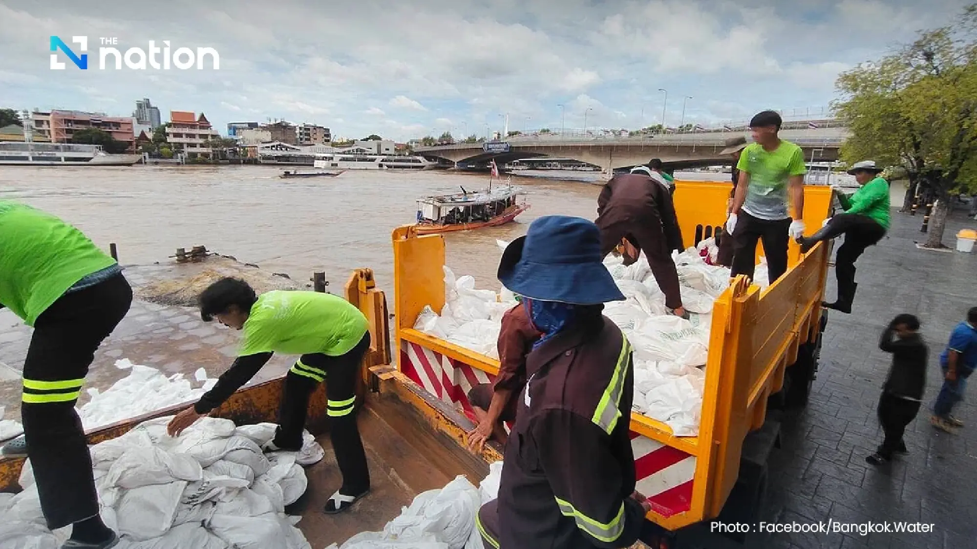 Heavy rain and strong winds cause flooding and fallen trees across Bangkok, disrupting traffic
