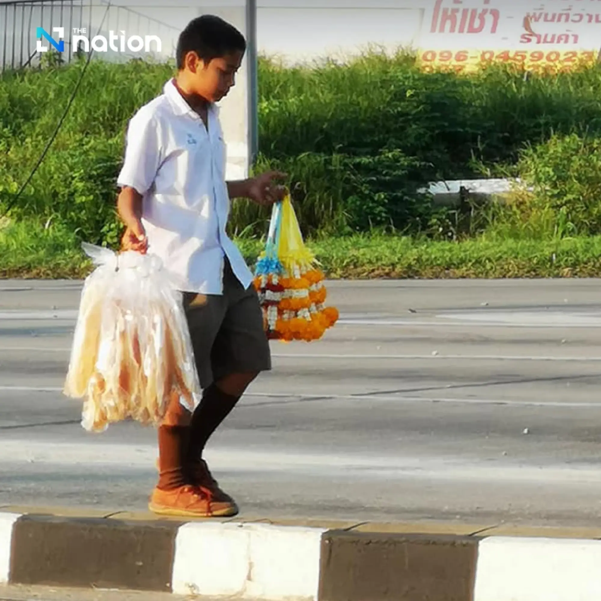 Why Thais sell flower garlands at red lights