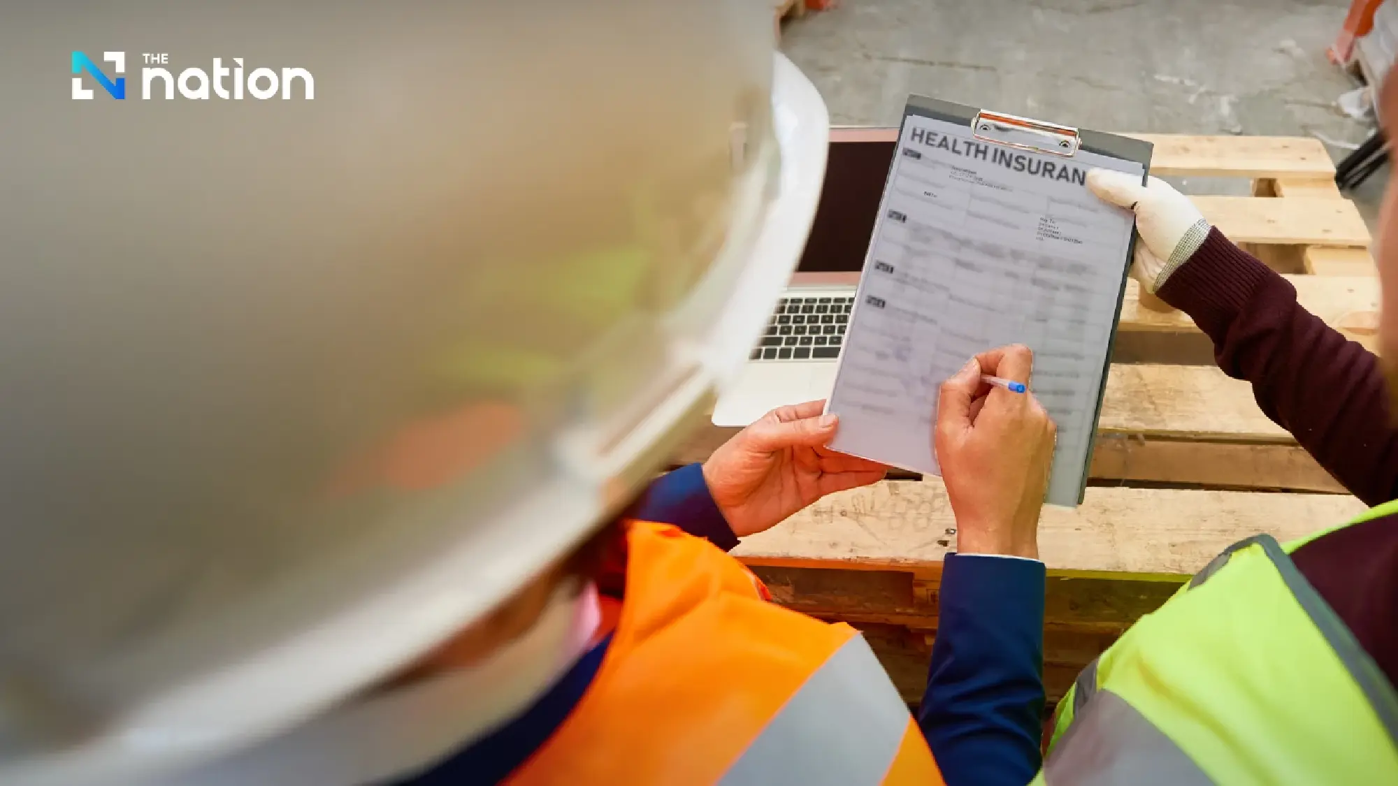 Migrant workers must buy health insurance to state cut costs