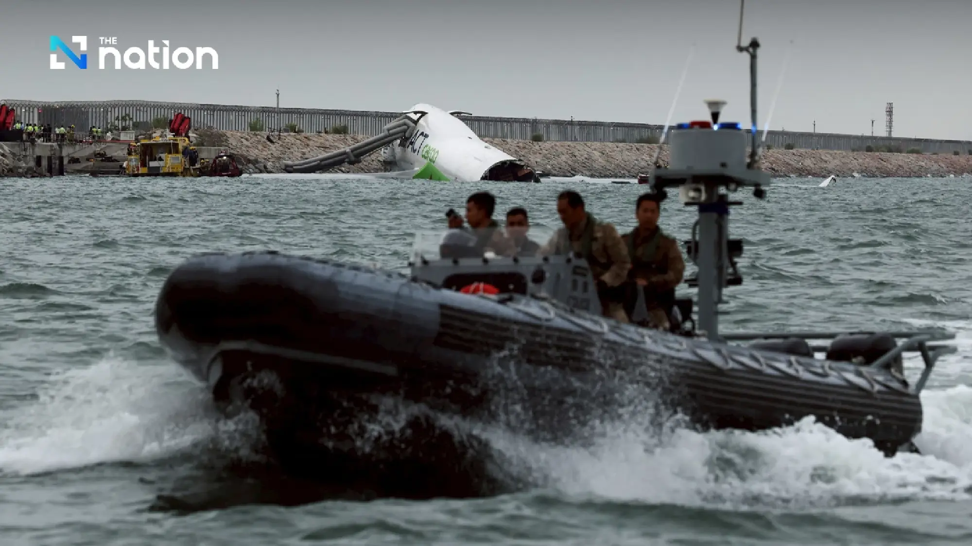 Cargo plane plunges into sea during landing at Hong Kong airport, killing two