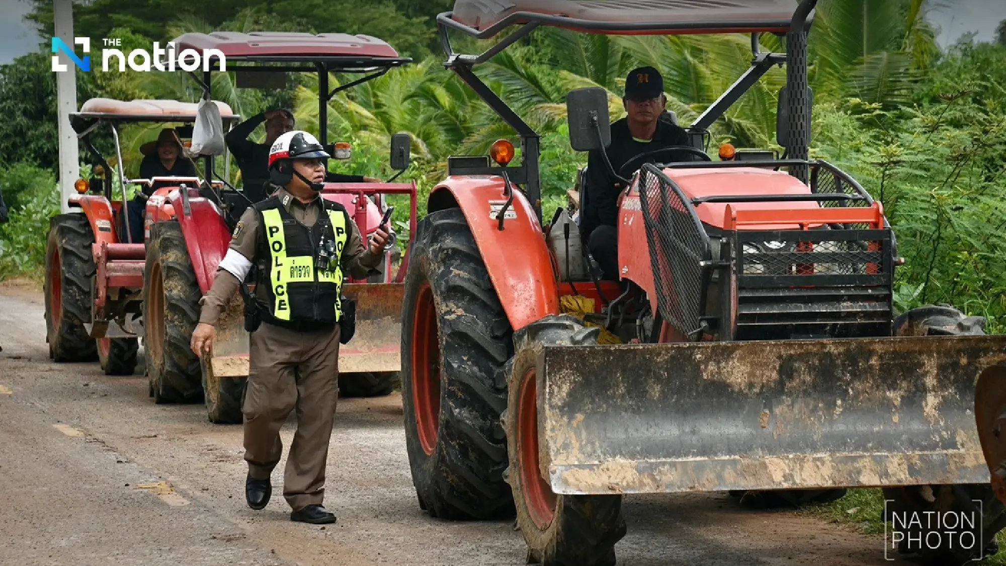 Activist Veera Somkwamkid, villagers gear up with excavator and tractors to reclaim Thai land 