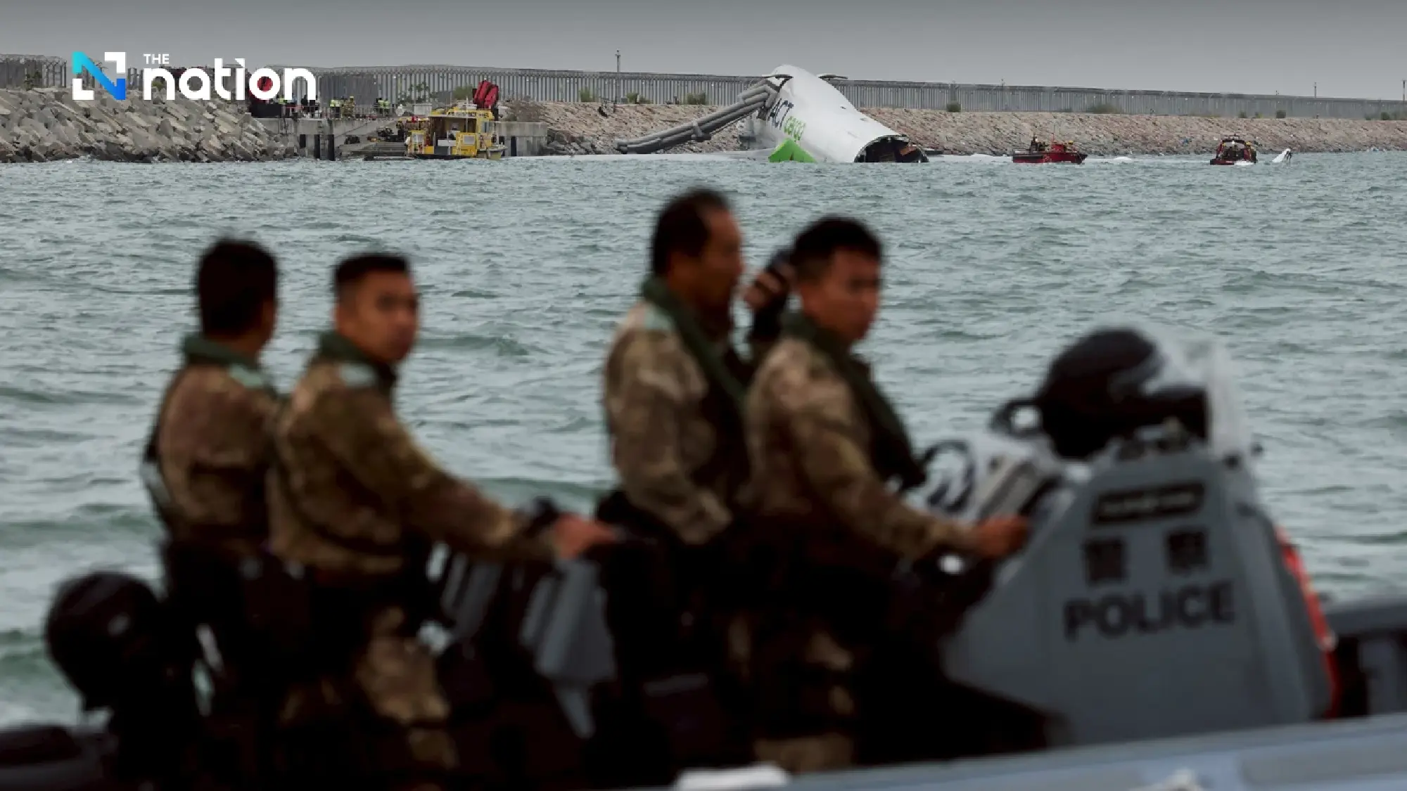 Cargo plane plunges into sea during landing at Hong Kong airport, killing two