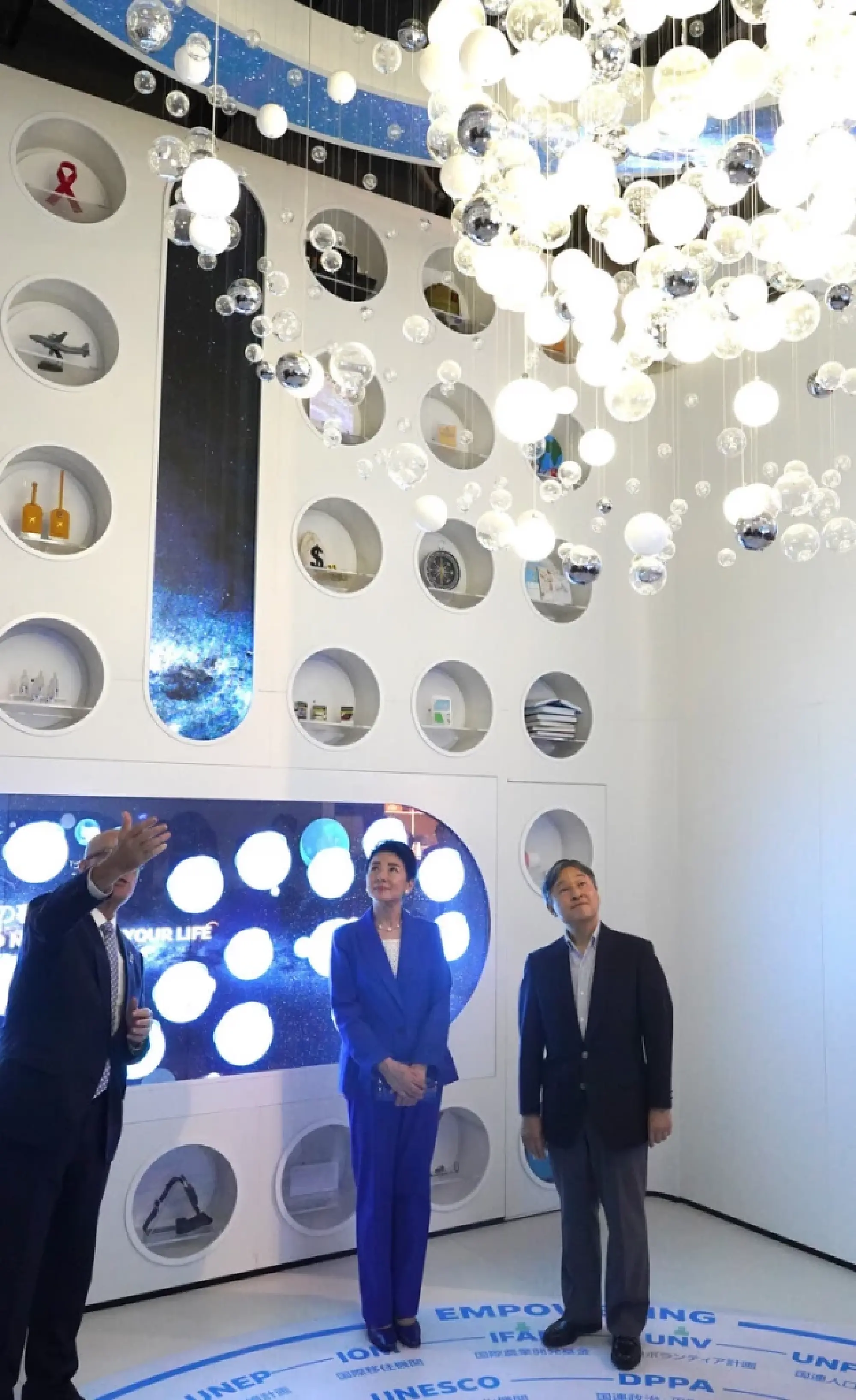 Japan's imperial couple revisit Osaka Expo