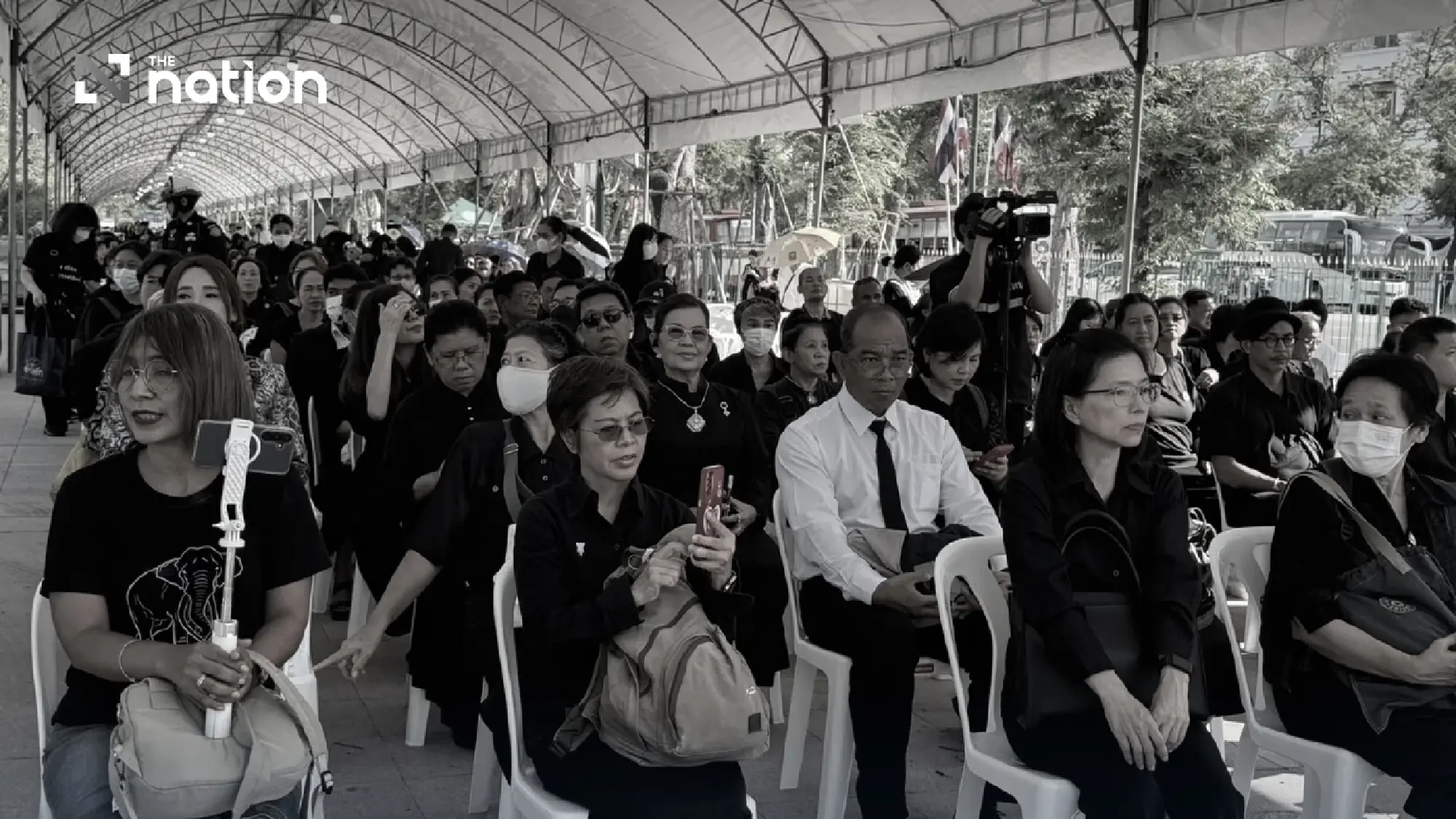 Thousands gather at Sanam Luang to pay respects in funeral bathing rite for Queen Sirikit