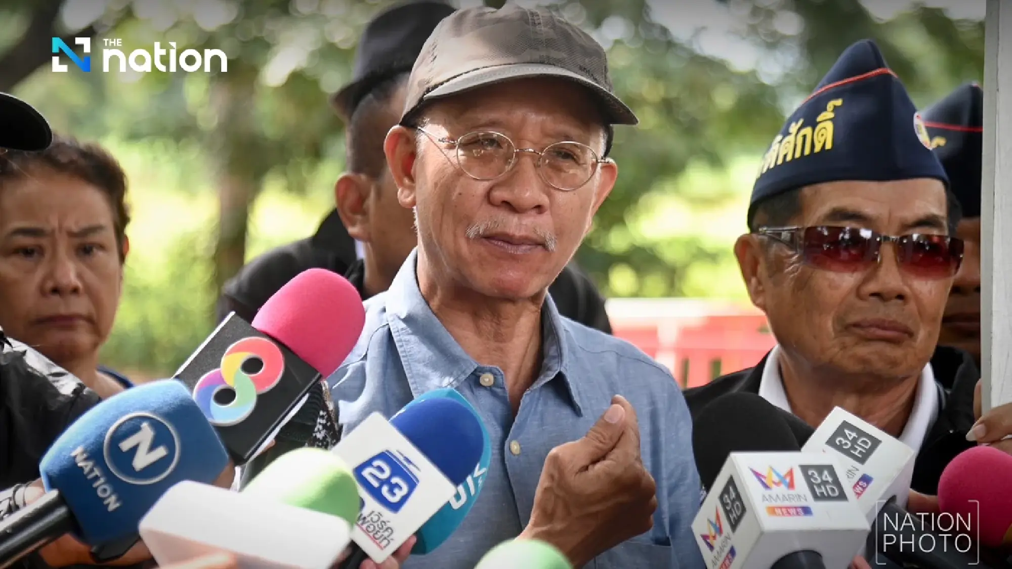 Activist Veera Somkwamkid, villagers gear up with excavator and tractors to reclaim Thai land 