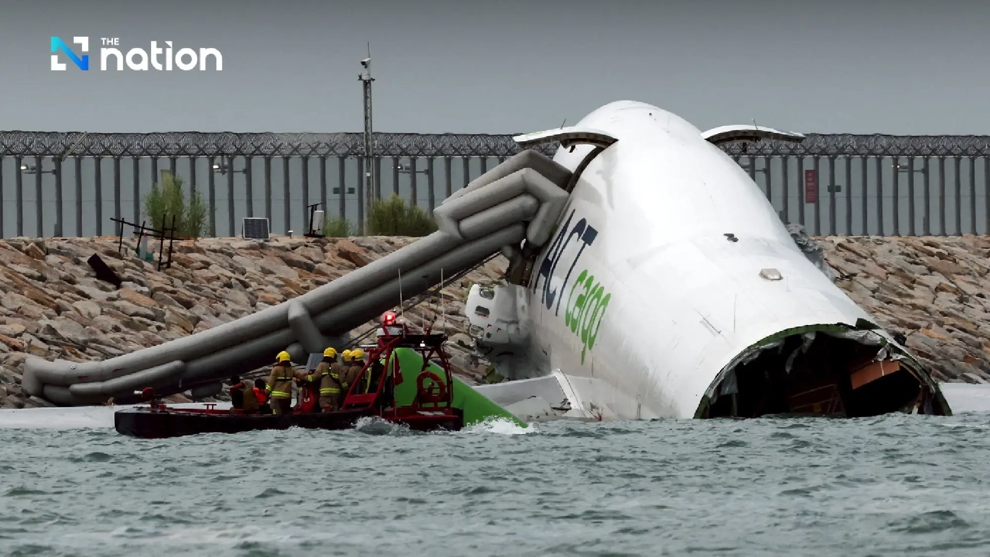 Cargo plane plunges into sea during landing at Hong Kong airport, killing two