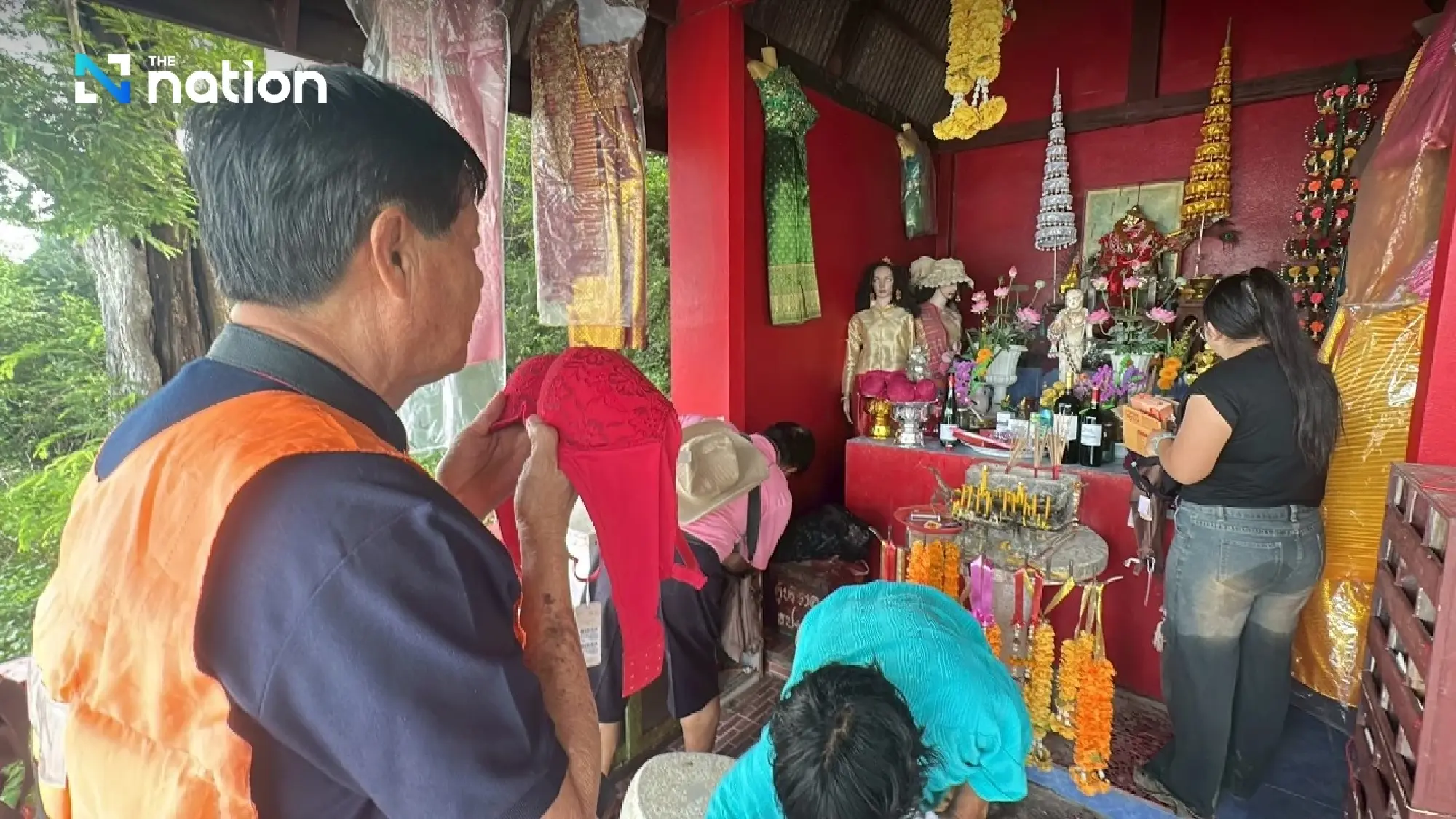 Thai shrine where bras are offered as tributes to fulfilled wishes