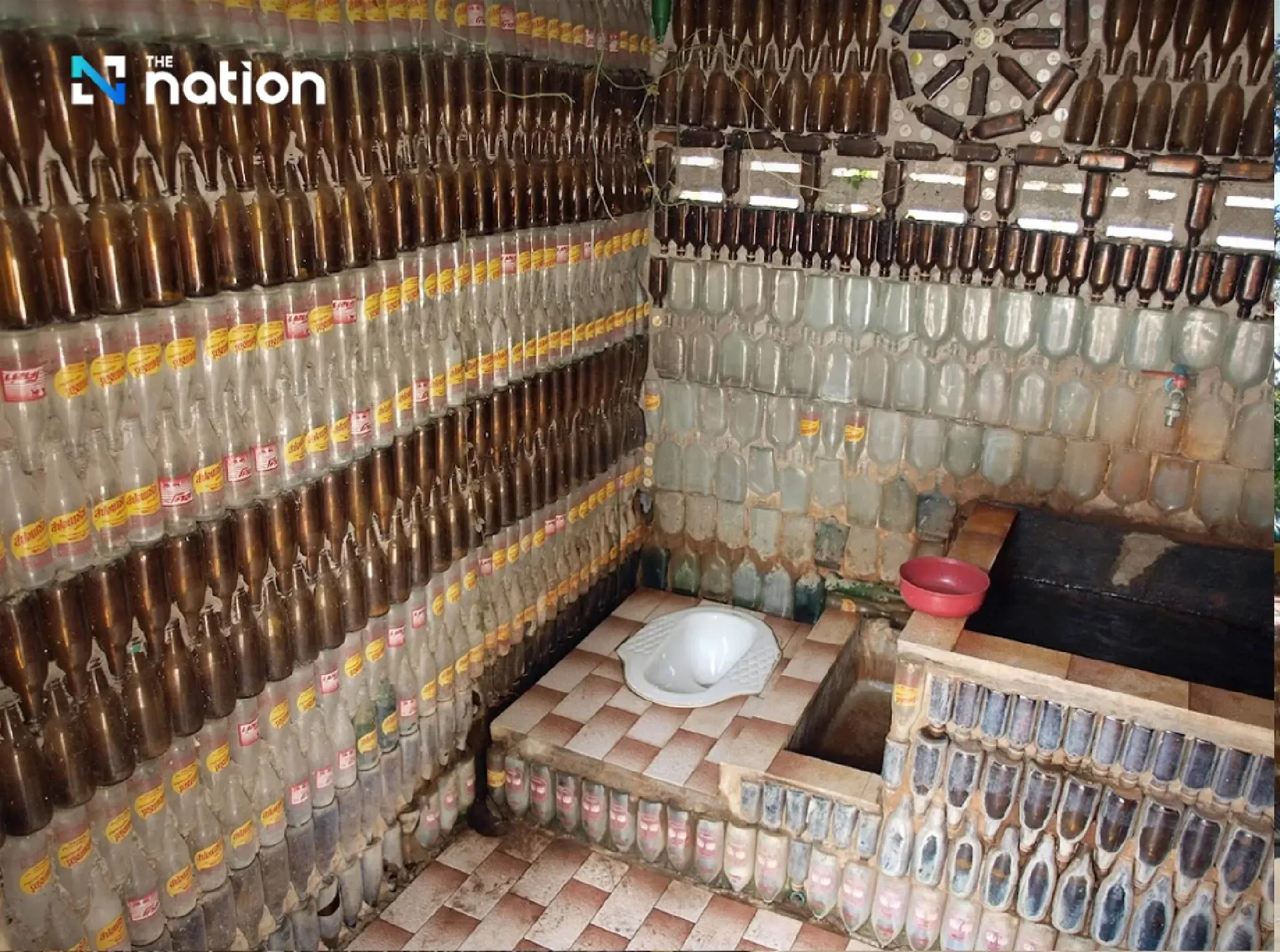 Thailand’s temple built from 1.5 million beer bottles turns trash into timeless beauty