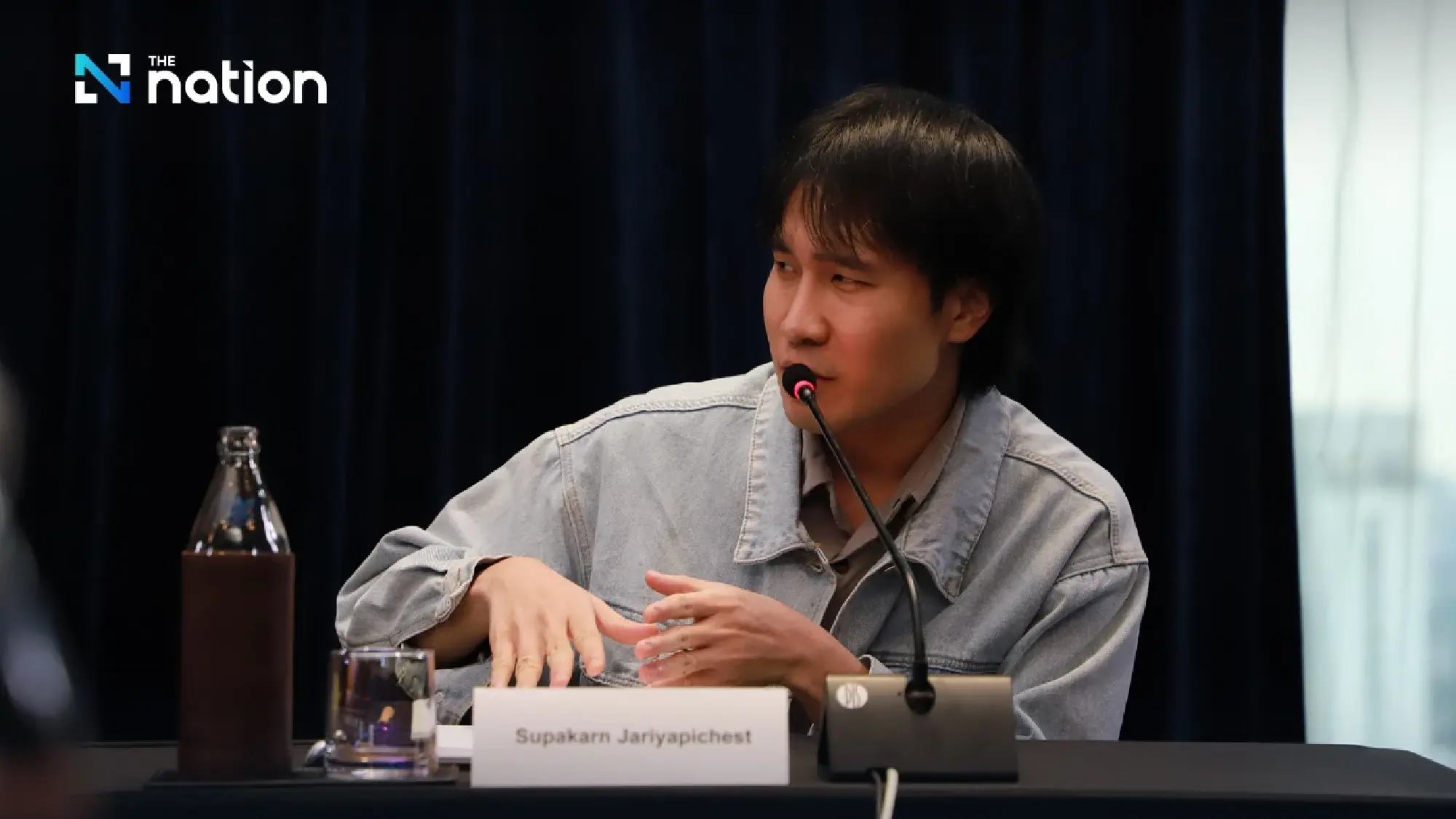 Supakarn Jariyapichest, a Thai travel content creator