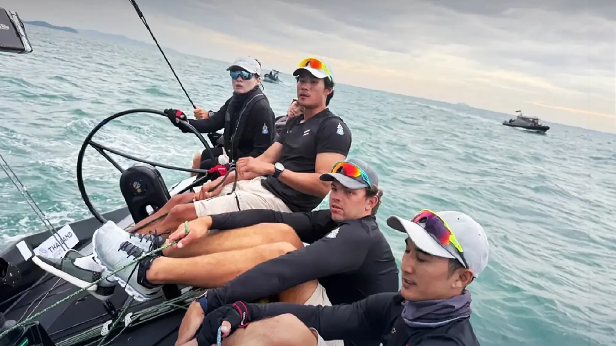 Queen Suthida trains with Thai sailing team ahead of SEA Games keelboat debut