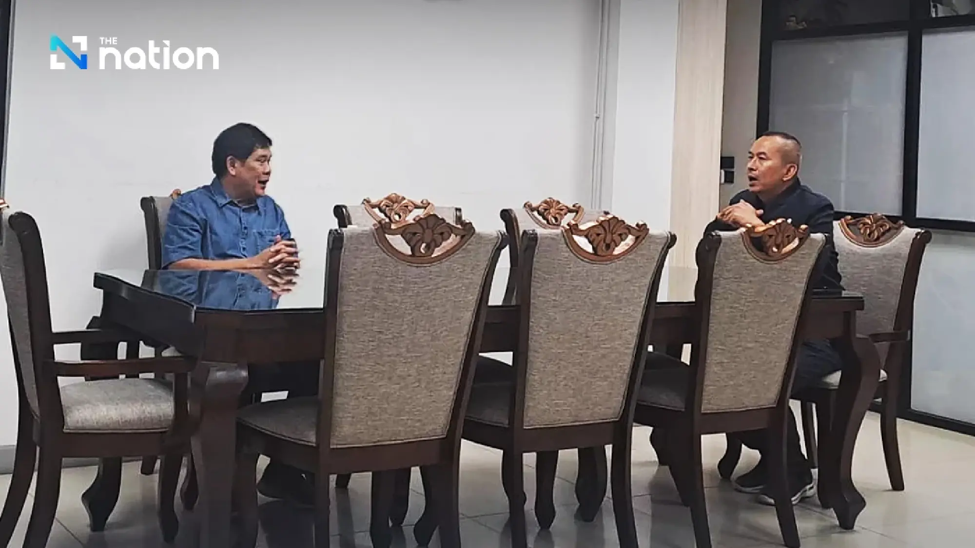 Nisit Sindhuprai surrenders to police after fleeing four-year jail sentence over ASEAN summit protest