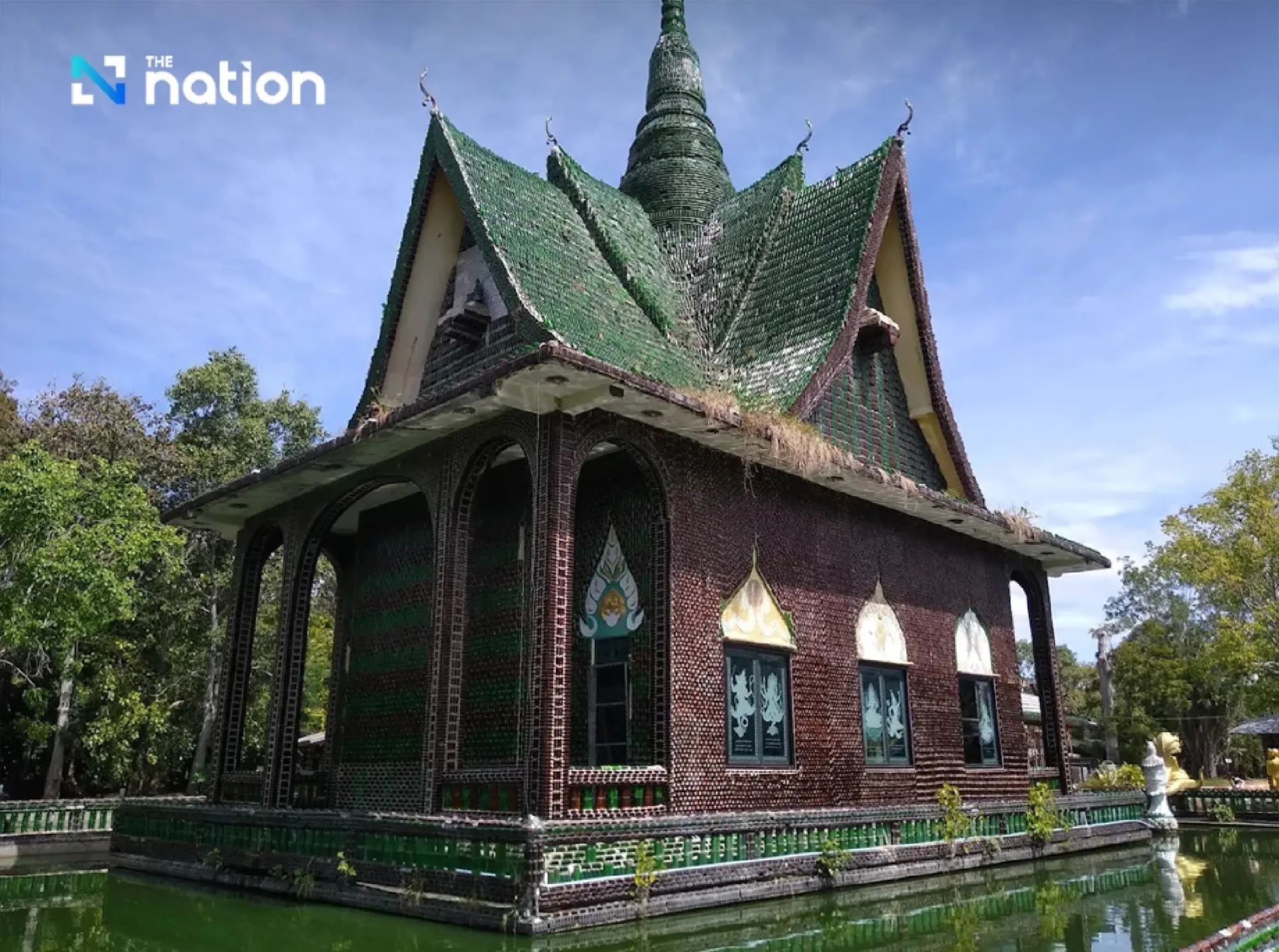 Thailand’s temple built from 1.5 million beer bottles turns trash into timeless beauty