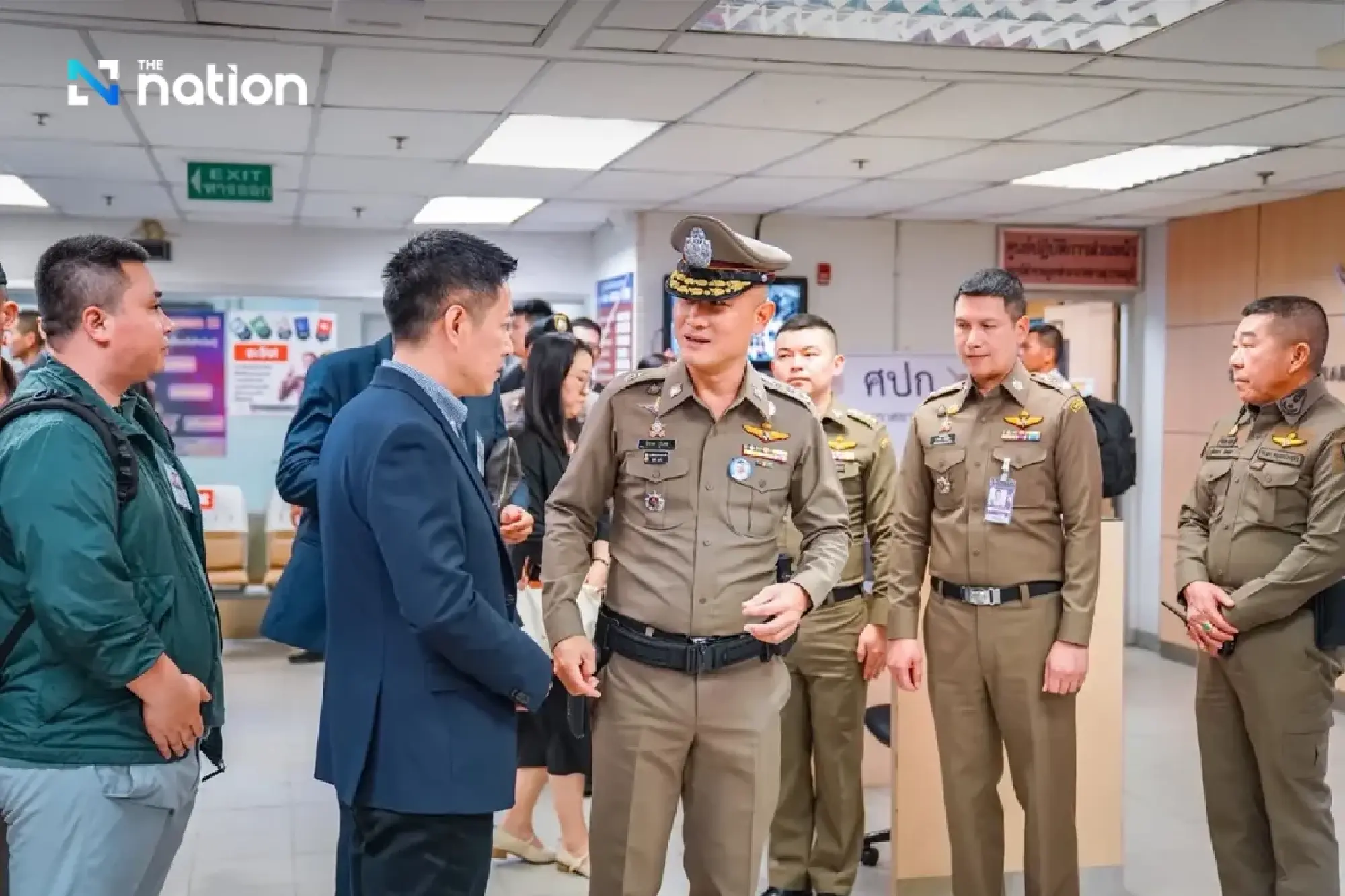 CIB commando team hands over She Zhijiang to Chinese police