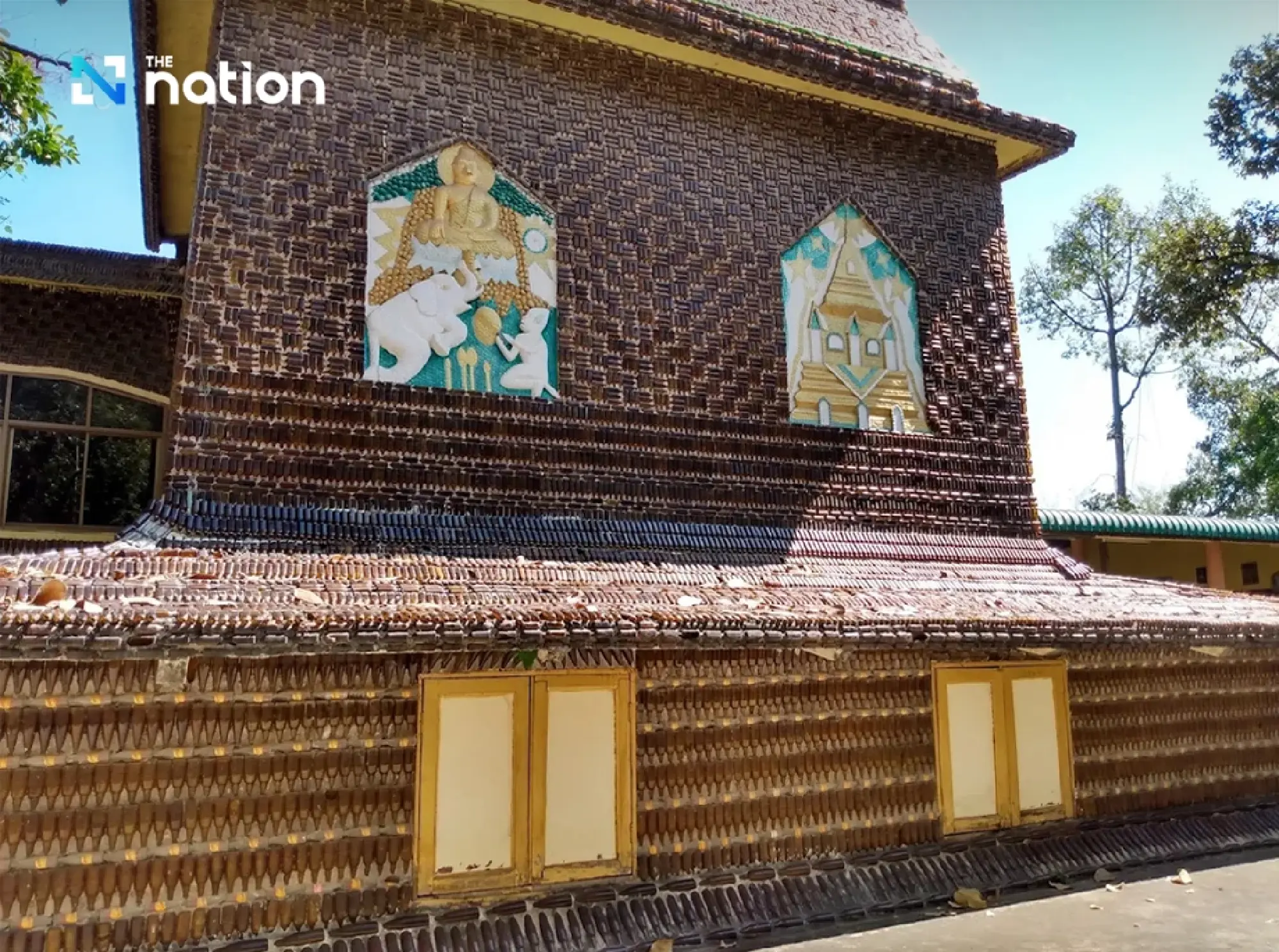 Thailand’s temple built from 1.5 million beer bottles turns trash into timeless beauty
