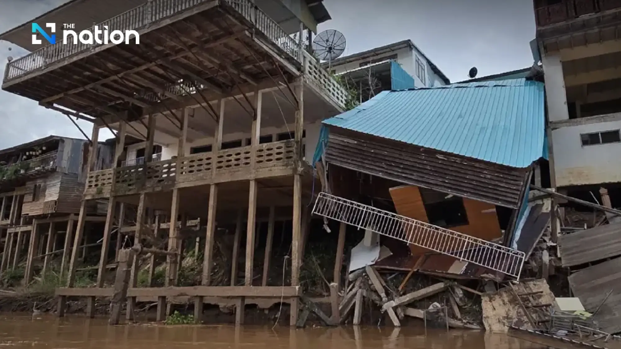Homes damaged as Nan riverbank collapses in Uttaradit, emergency declared