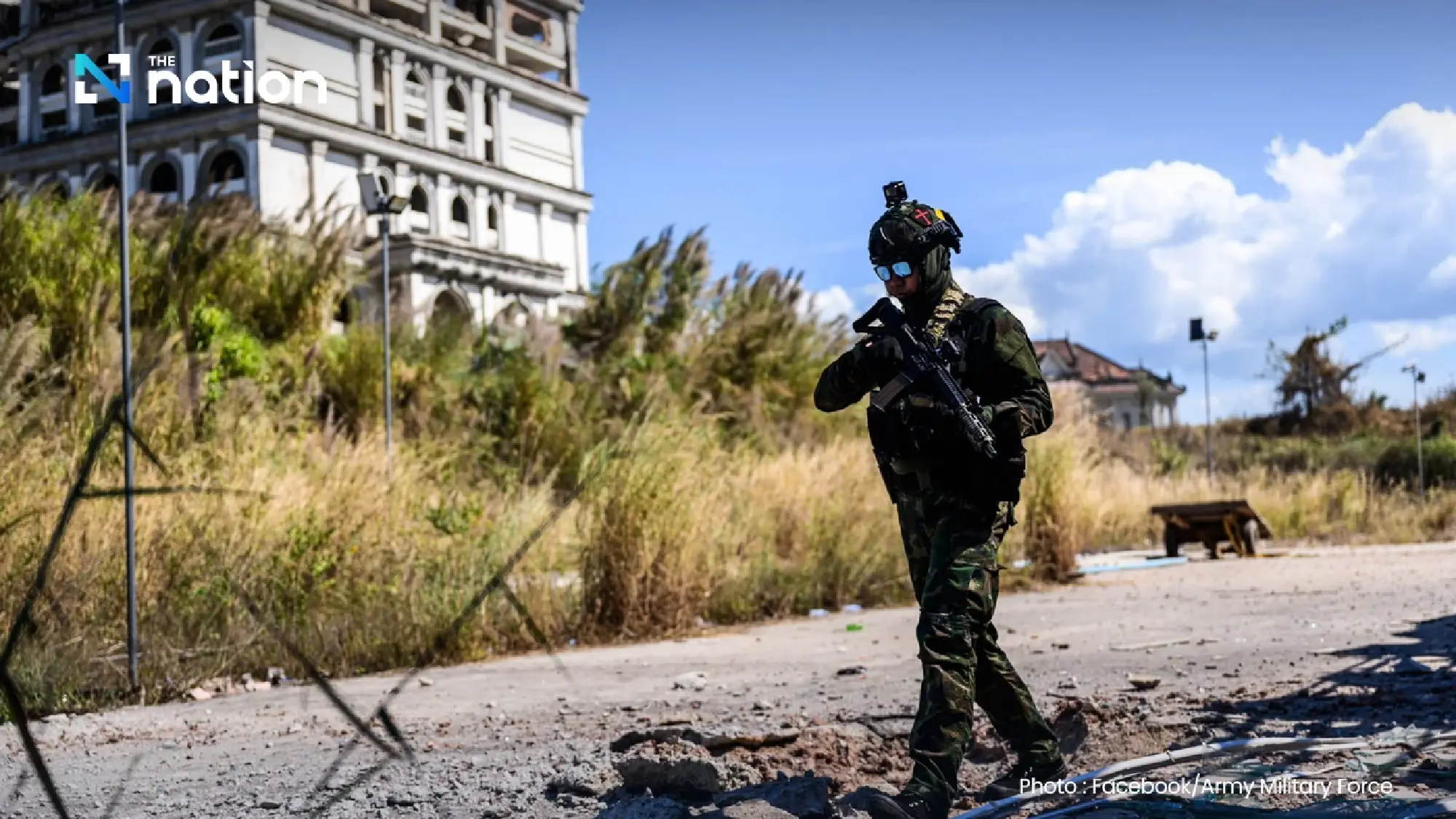 Marines secure area encroached on by Cambodian casino and residential building