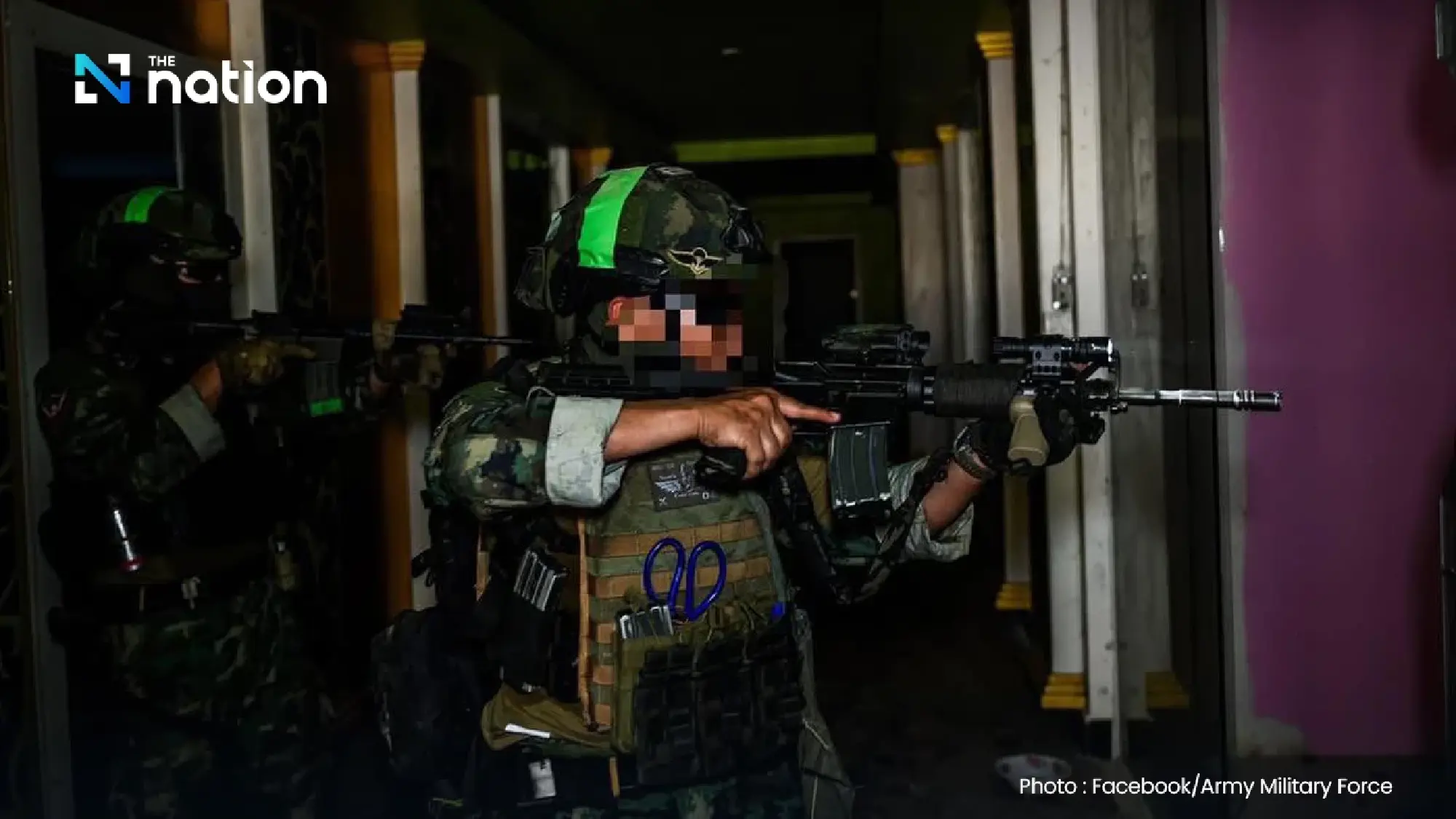 Marines secure area encroached on by Cambodian casino and residential building