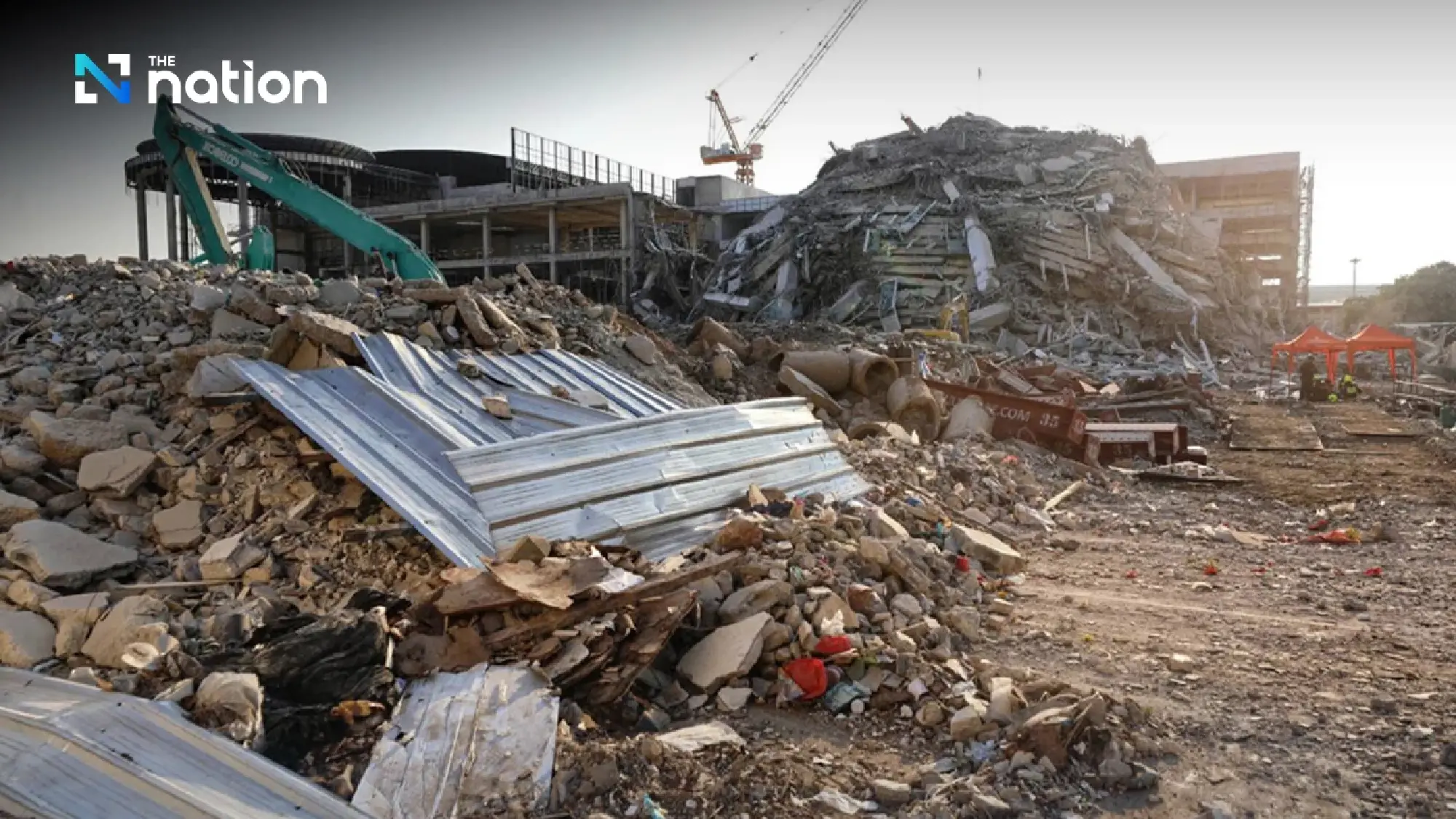 Probe finds substandard concrete and illegal design in State Audit Office building collapse; 23 indicted