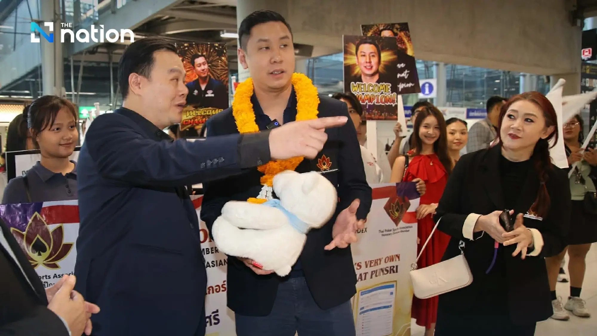 First Asian world poker champ returns home after making history