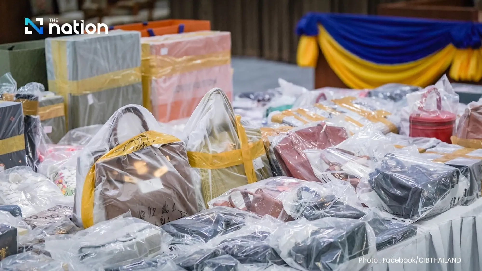 Assets worth 114m baht seized in five-province raids on fake online investment scheme