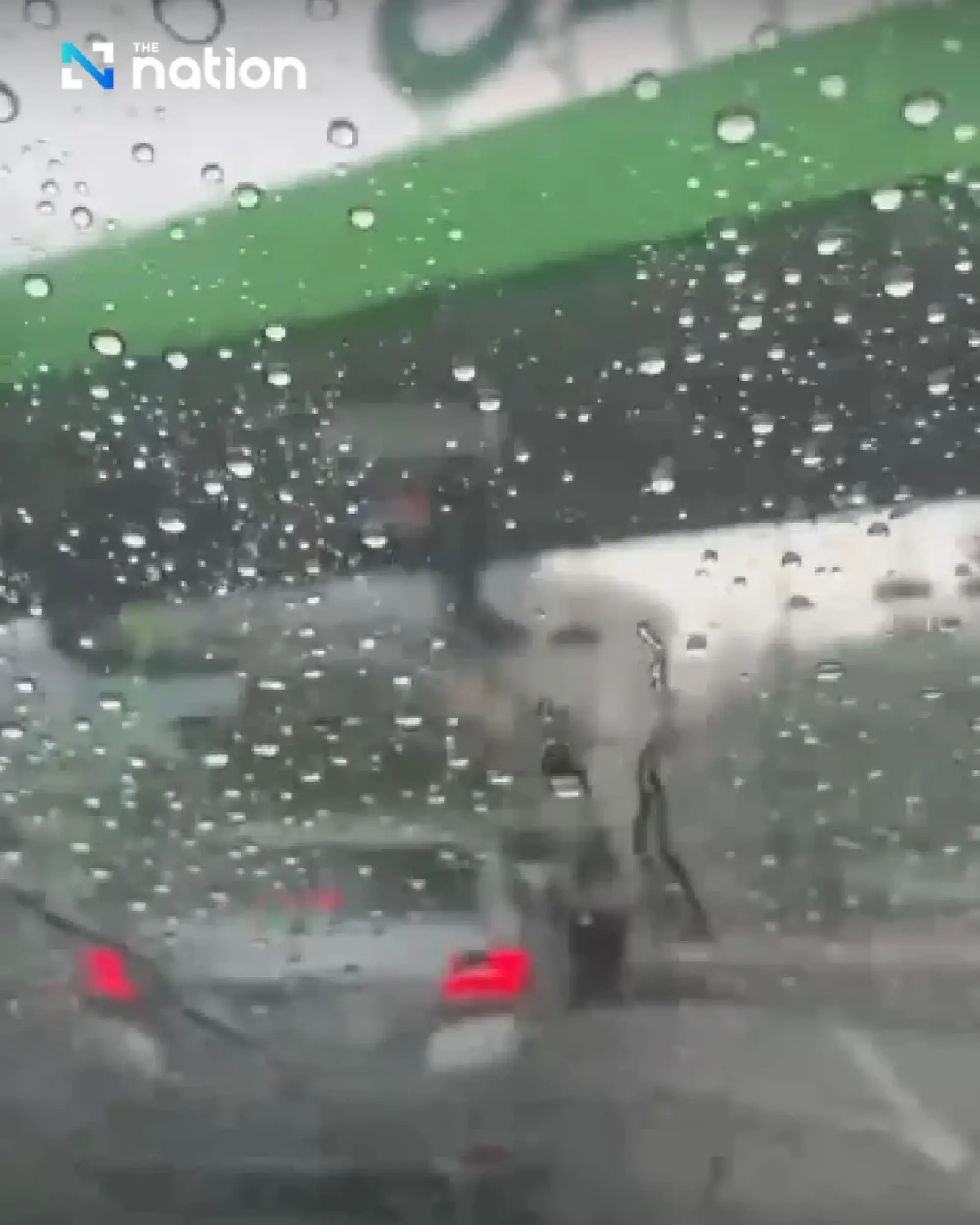 Heavy rain hits Bangkok on election day, traffic snarls in Phra Khanong and Ratchada as voters press on