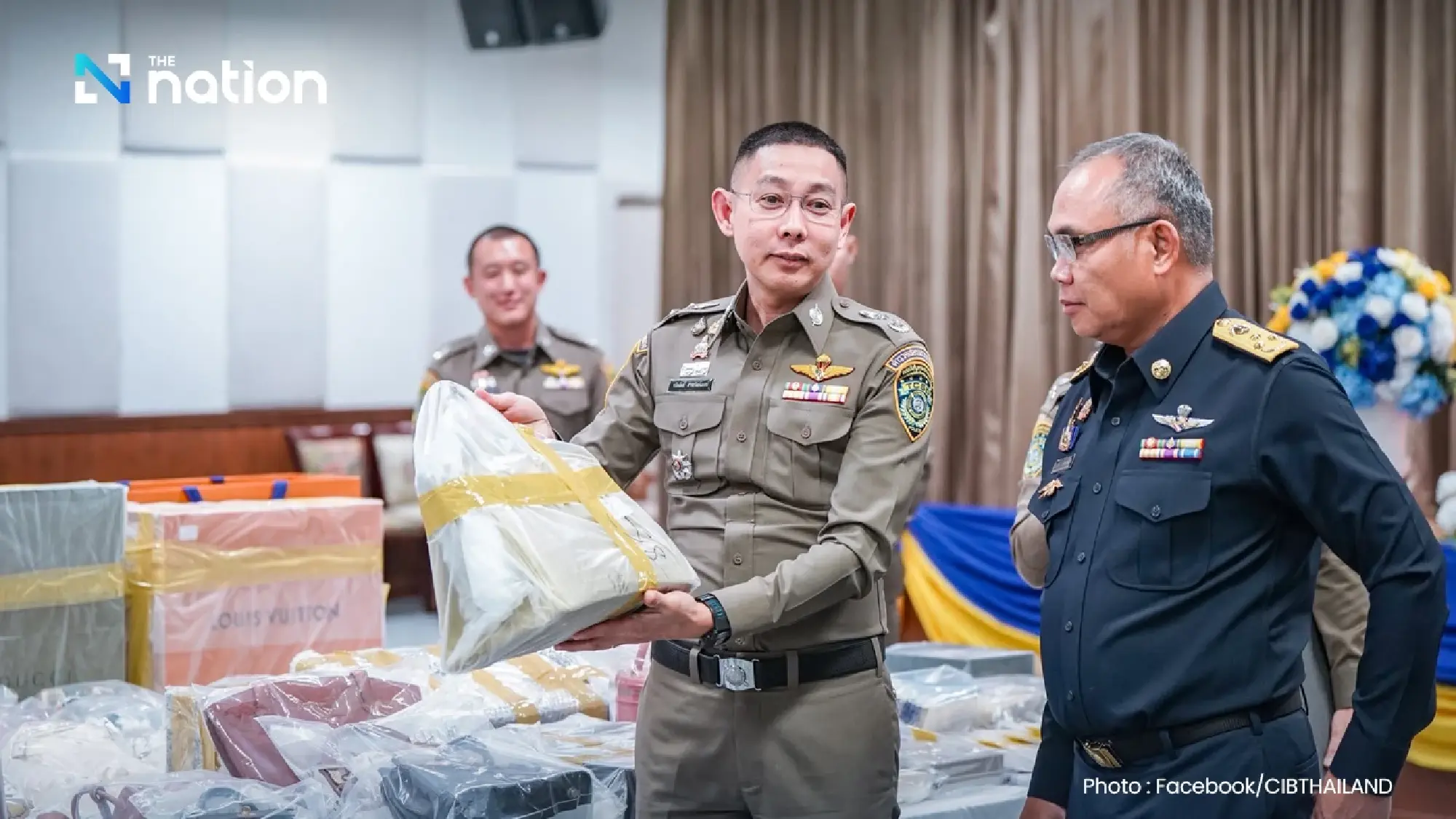 Assets worth 114m baht seized in five-province raids on fake online investment scheme