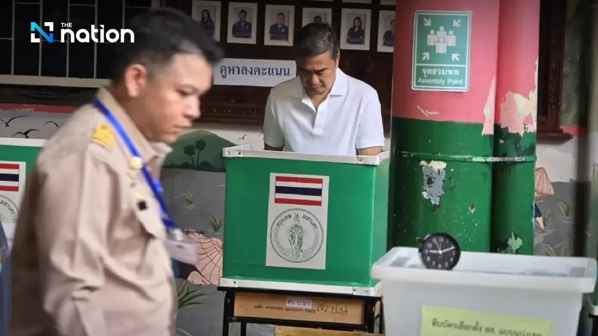 Abhisit pleased as Thais turn out early on election day to vote