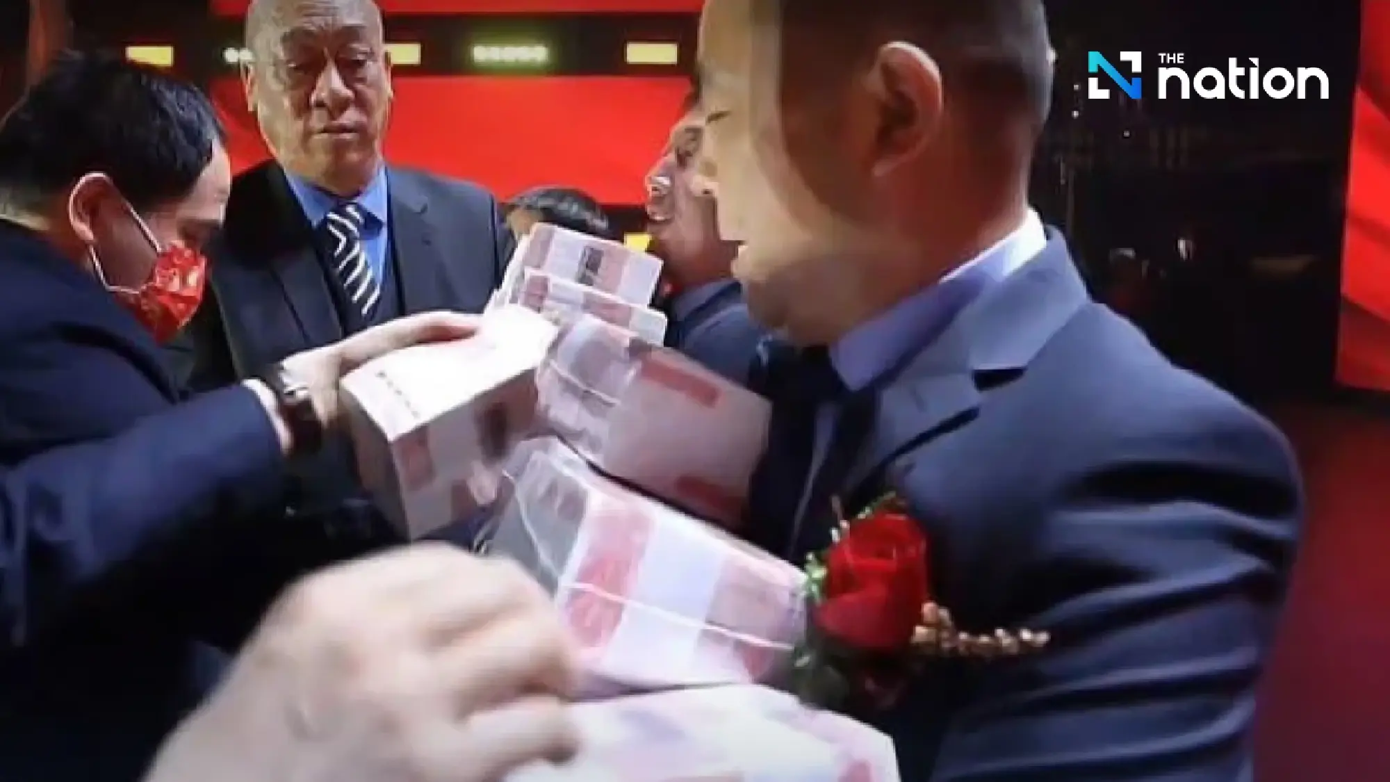 Chinese boss hands out US$26 million in bonuses, staff can take home as much cash as they count