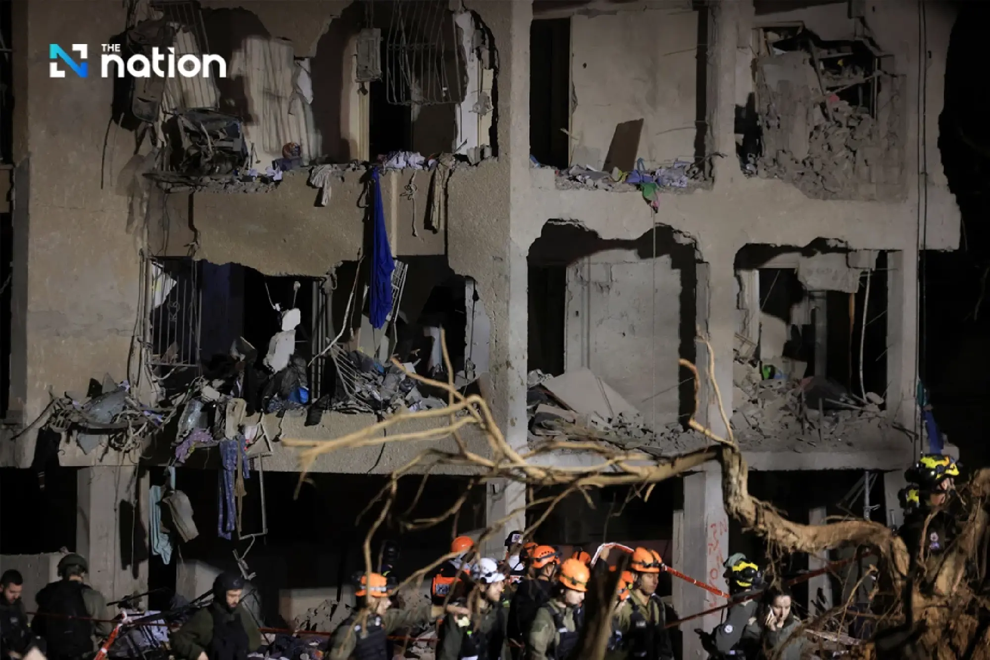 Iran fires missiles at city near Israeli nuclear facility, injuring more than 100