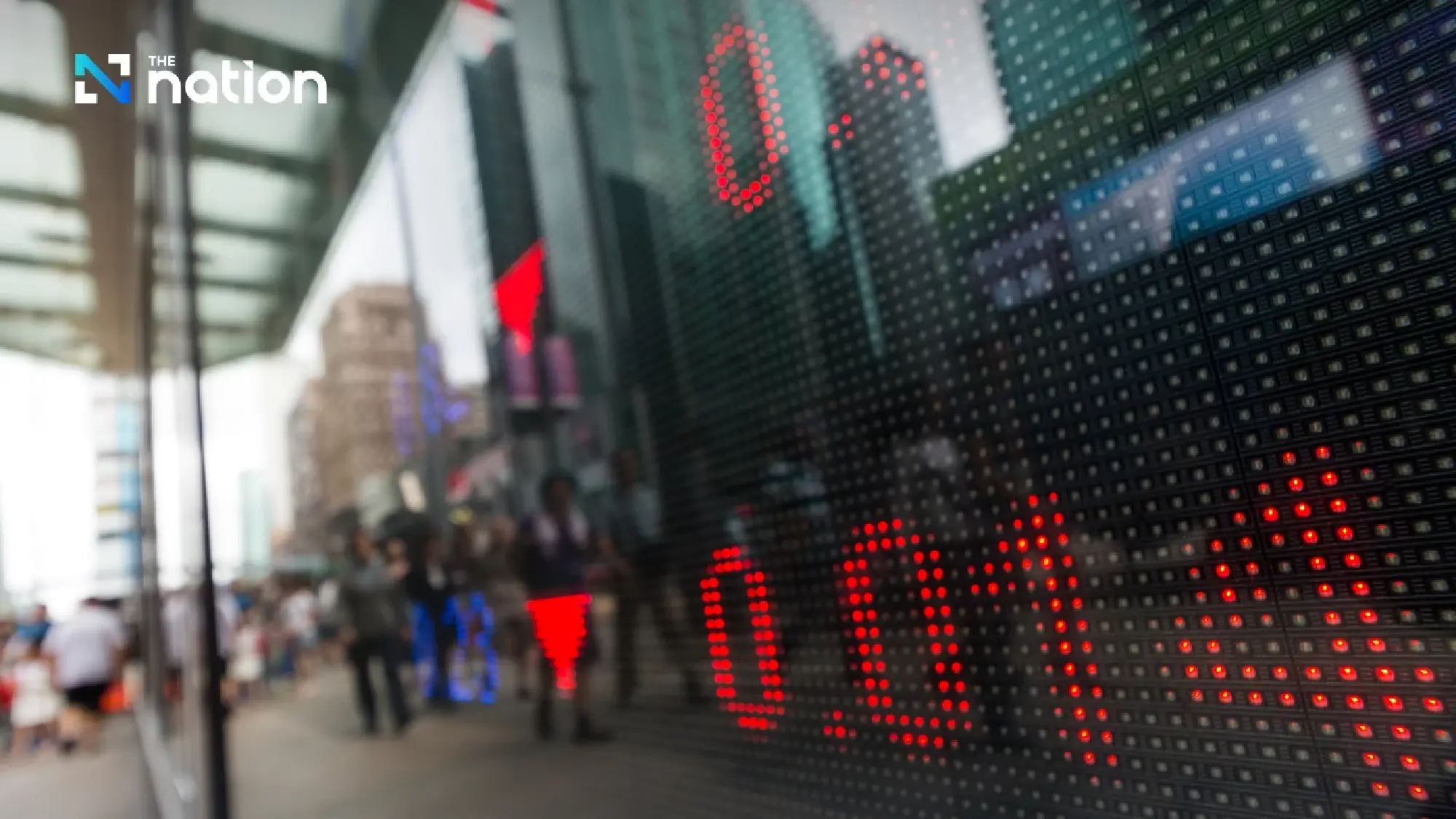 Fed holds rates steady, warns of fallout from Iran war