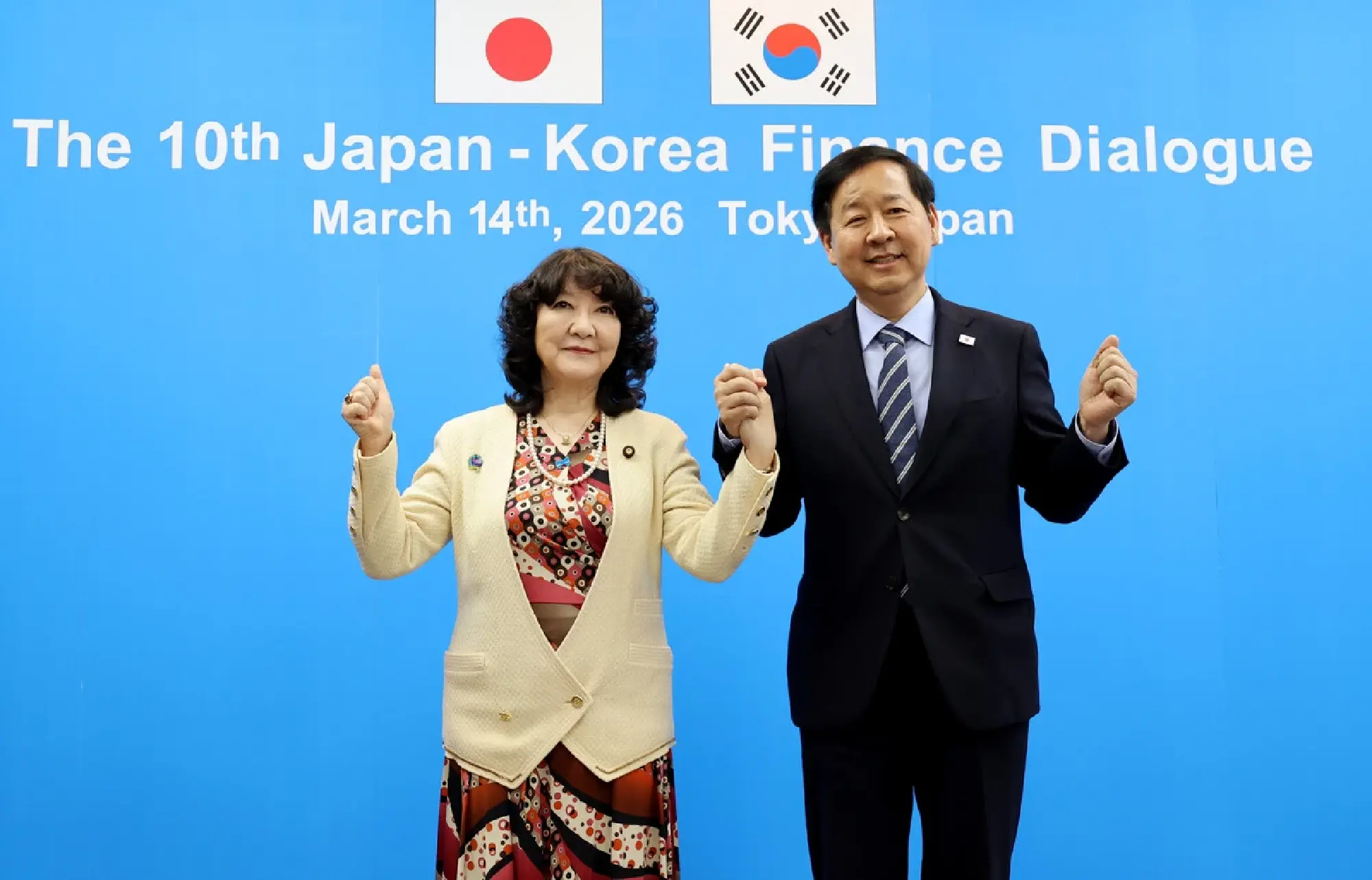 Japanese Finance Minister Satsuki Katayama (left) and South Korean Deputy Prime Minister and Minister of Finance and Economy Koo Yun-cheol pose for a photo at a bilateral minister-level finance dialogue held in Tokyo on Saturday. (Courtesy of Japans Finance Ministry)
