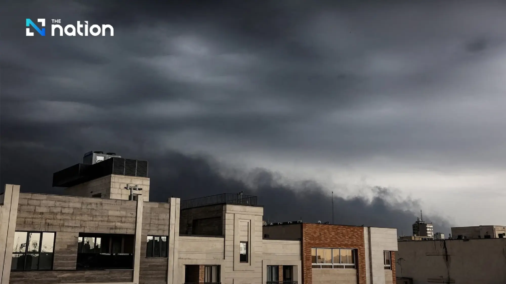 Black acid rain hits Iran after oil depot blasts, harming health and environment