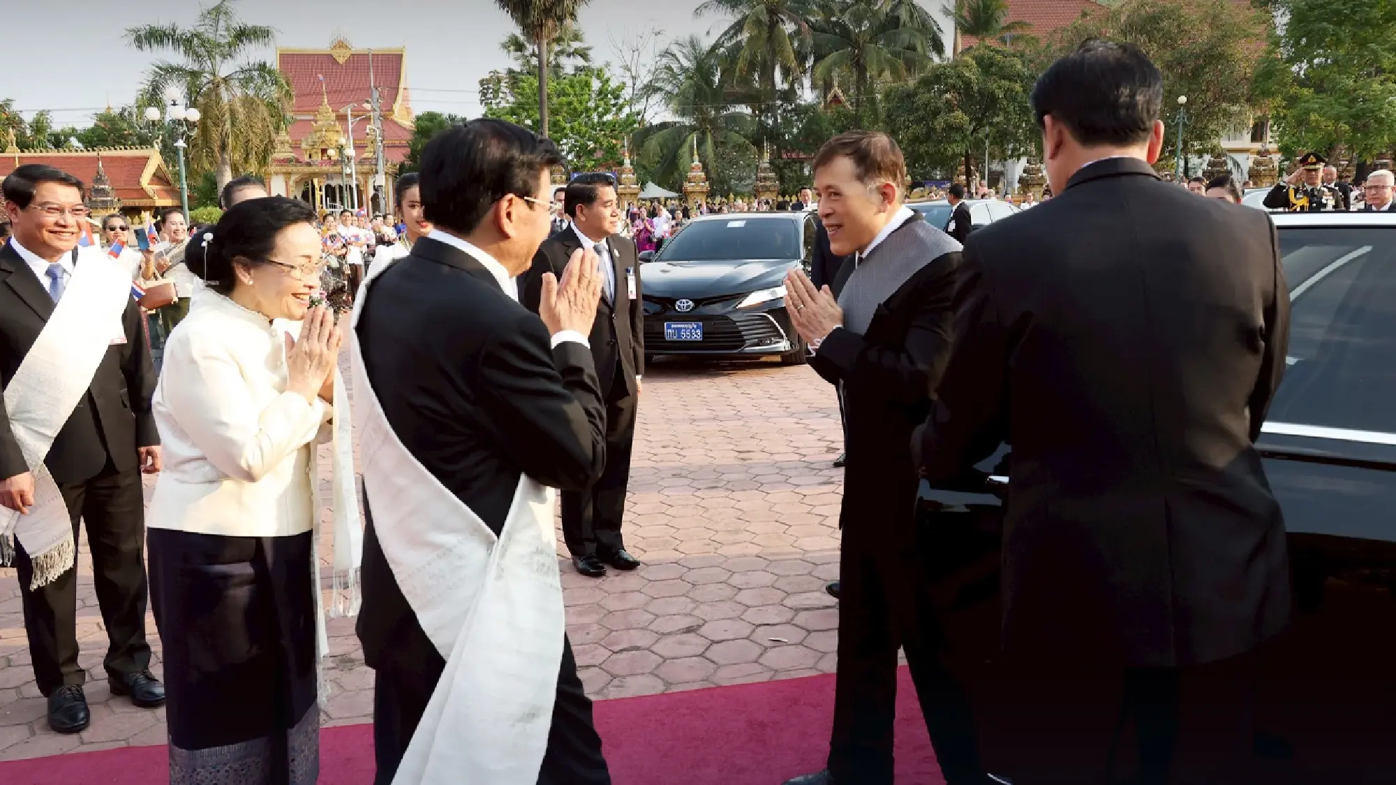 Their Majesties the King and Queen pay respects at Pha That Luang before concluding official visit to Laos