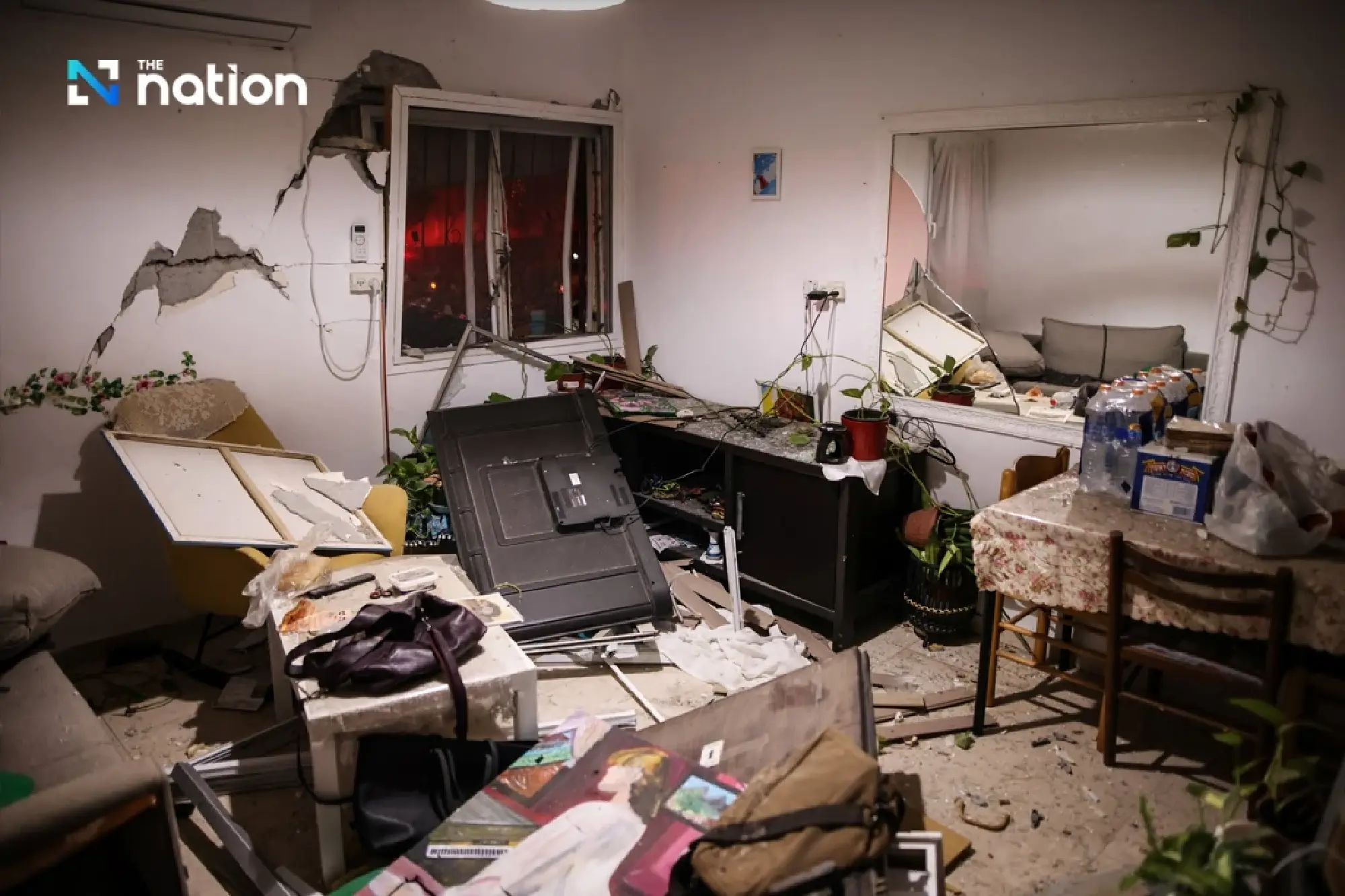 Iran fires missiles at city near Israeli nuclear facility, injuring more than 100