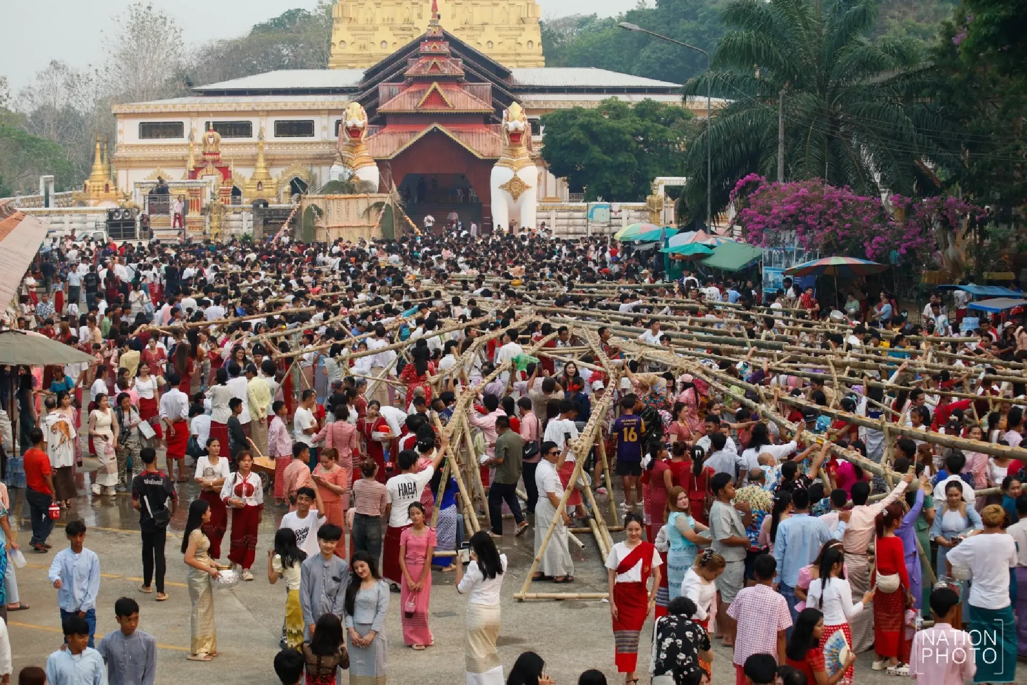 One of a kind: Mon Songkran rite bathes monks through bamboo channels