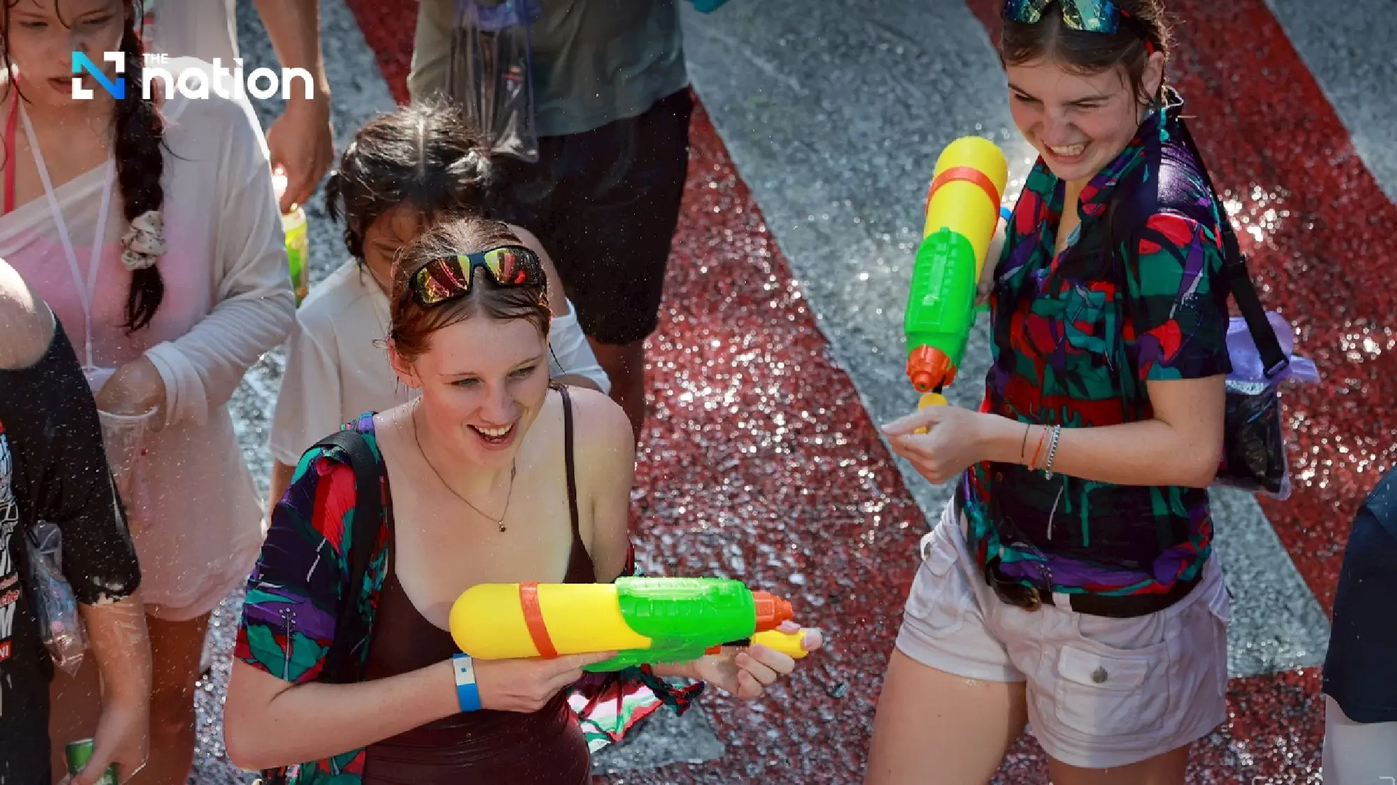 Songkran crowds swamp Silom as New Phran Nok grinds to a halt