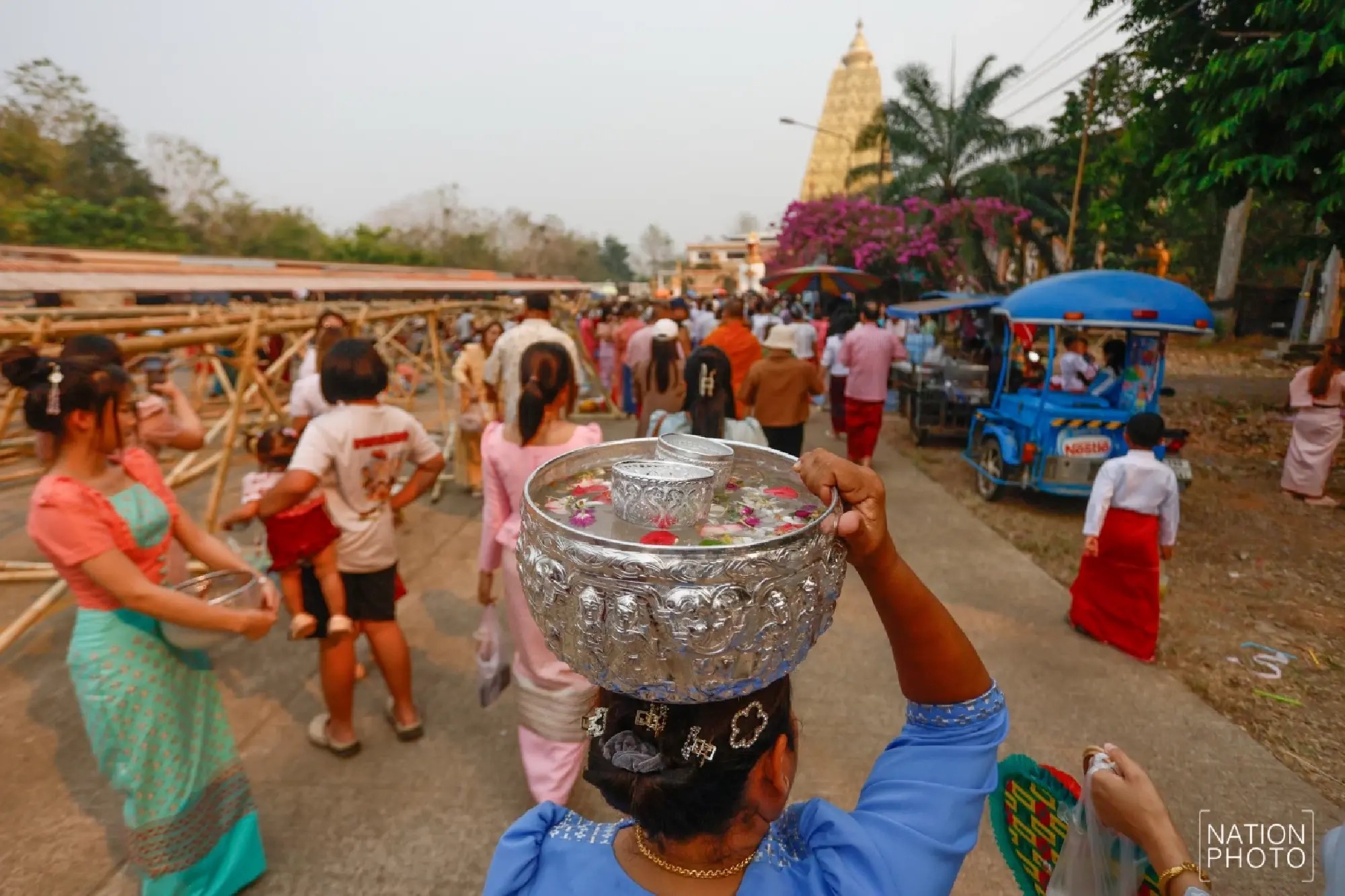 One of a kind: Mon Songkran rite bathes monks through bamboo channels