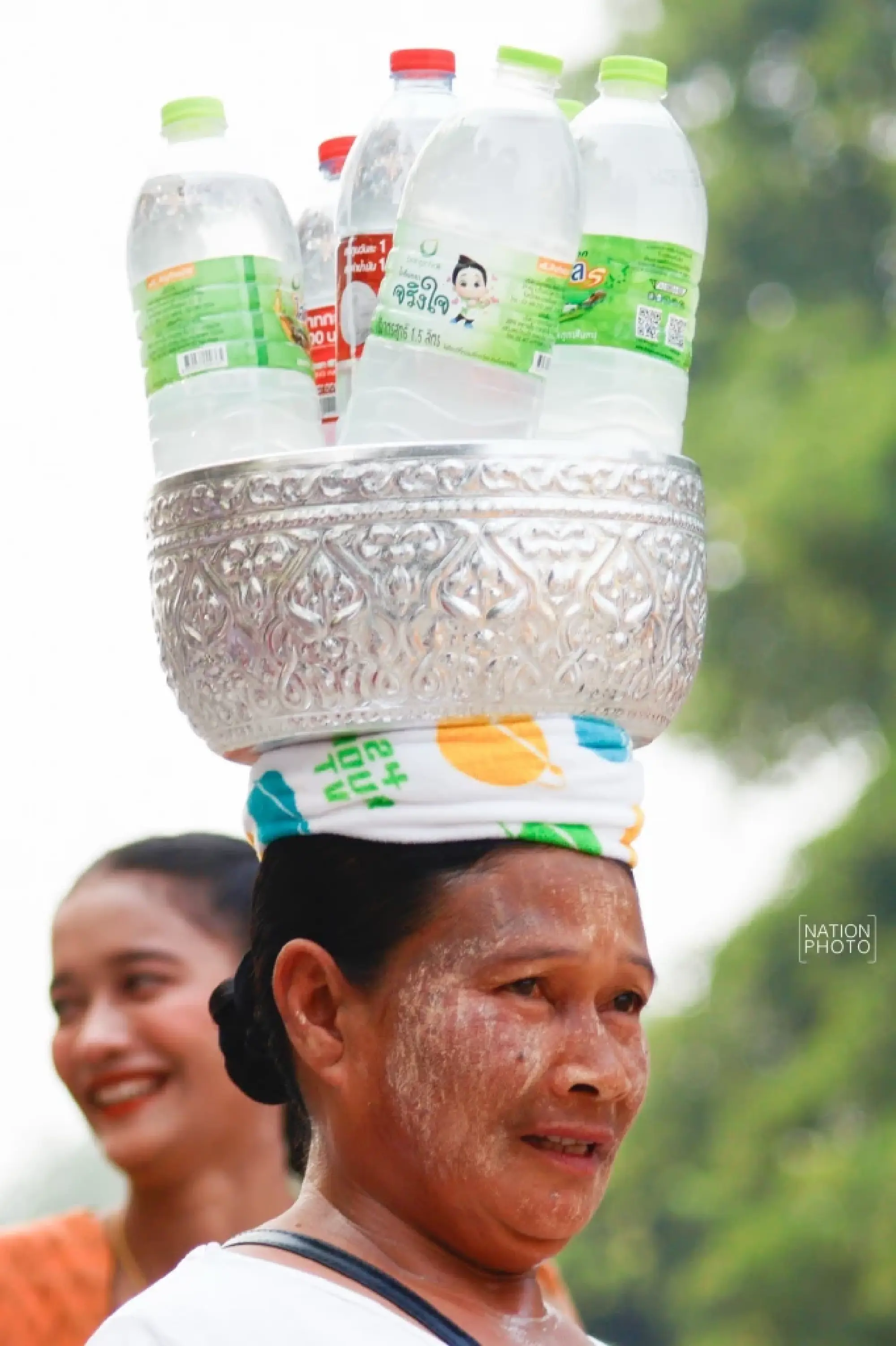 One of a kind: Mon Songkran rite bathes monks through bamboo channels