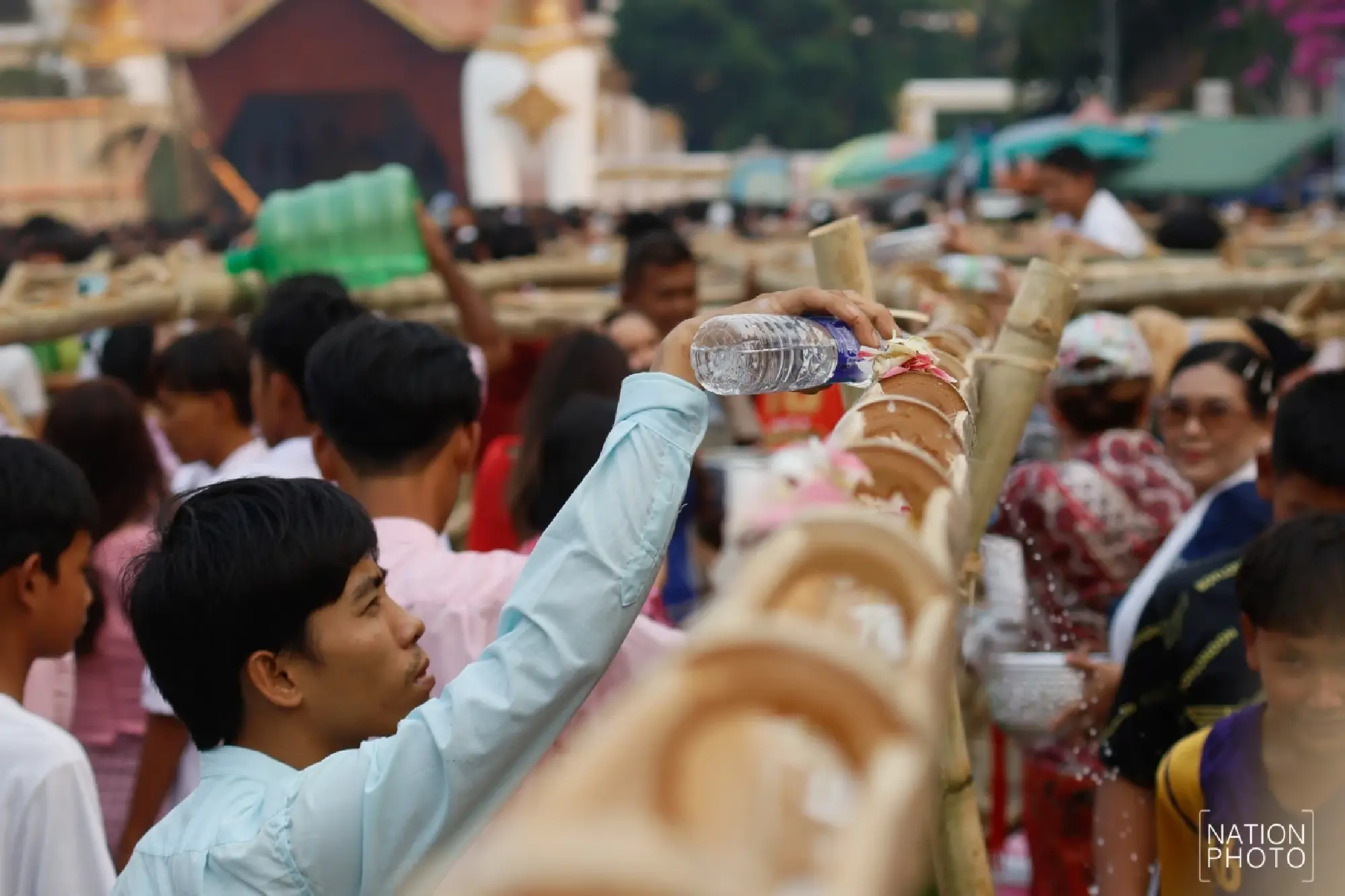 One of a kind: Mon Songkran rite bathes monks through bamboo channels