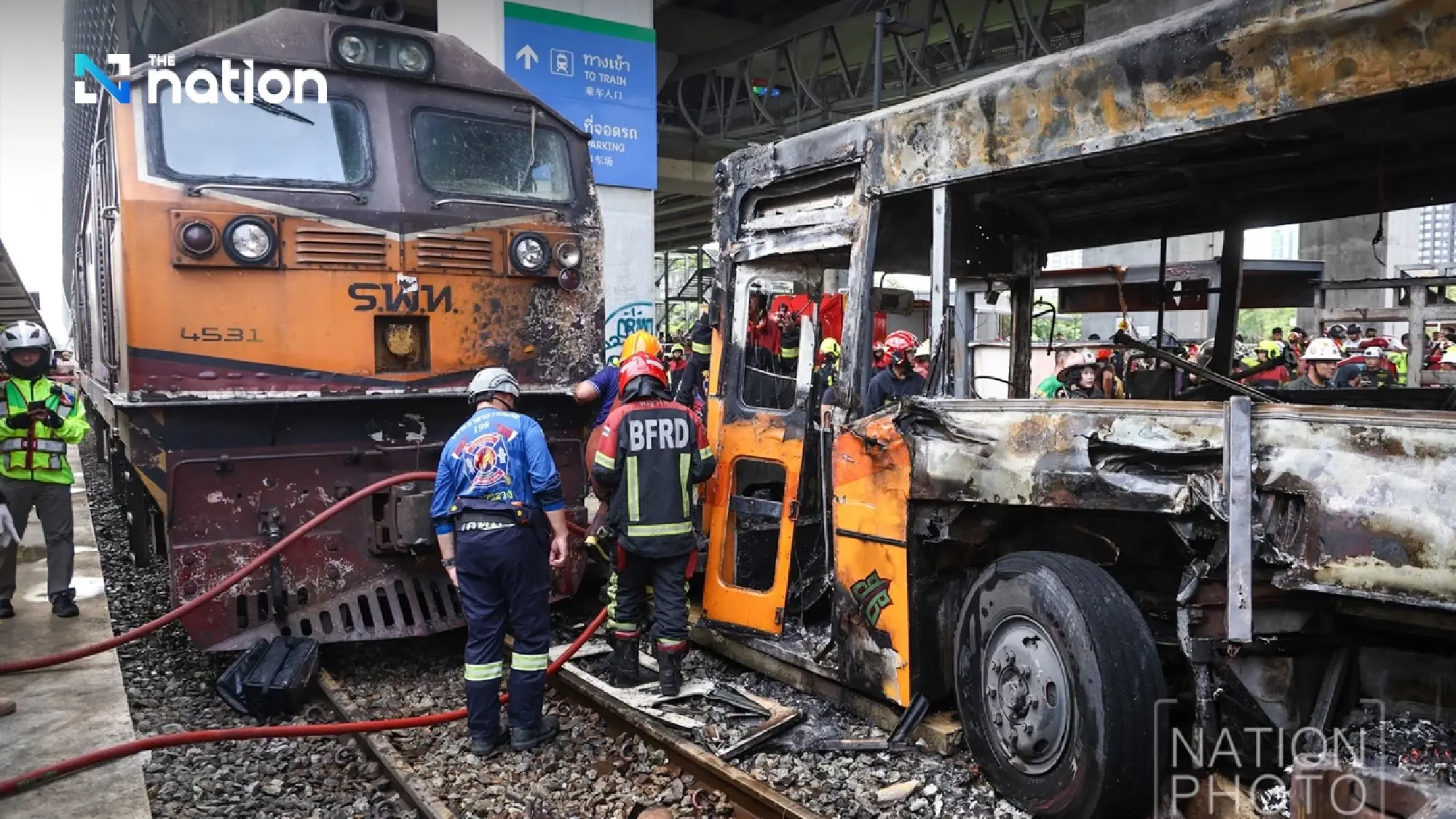 Update: Train-bus crash leaves 8 dead, dozens injured