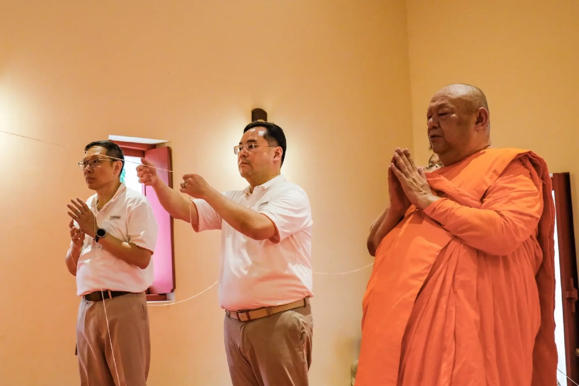 CKPower and CH. Karnchang Group Install Ceremonial Umbrella Above the Principal Buddha Image at Wat Na Huai’s 200-Year-Old Ordination Hall to Preserve Thailand’s Cultural Heritage