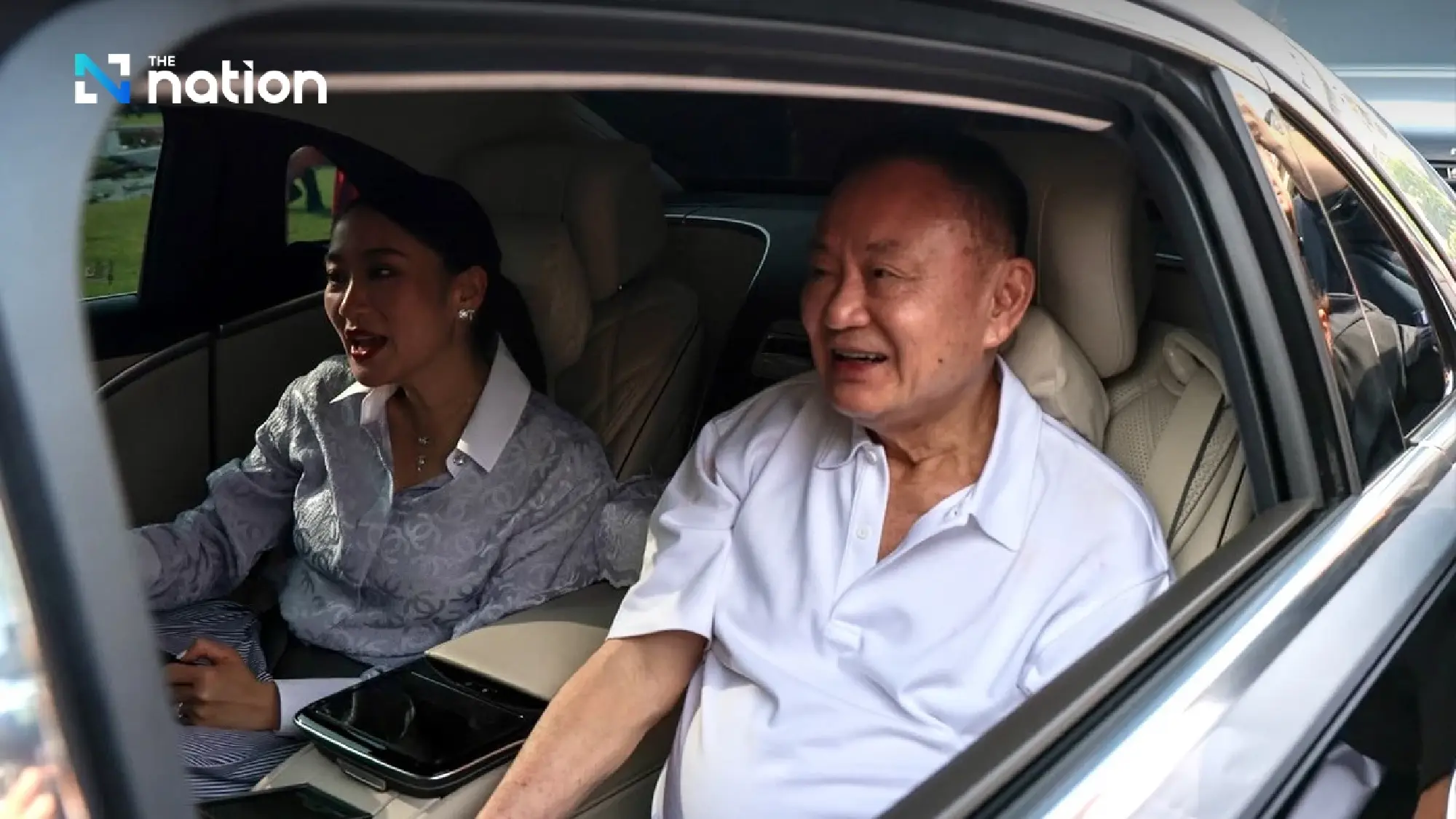Thaksin walks free to cheers from family and red shirts