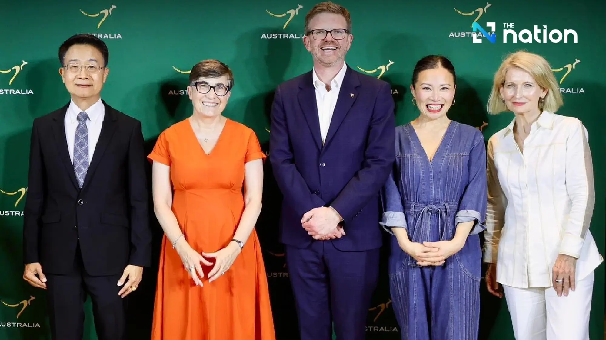 Australian Ambassador to Thailand, Dr Angela Macdonald in orange dress. Austrade General Manager Southeast Asia, Ms Catherine Gallagher wears white suit. South Australian Minister for State Development Chris Picton in the middle wearing blue suit.