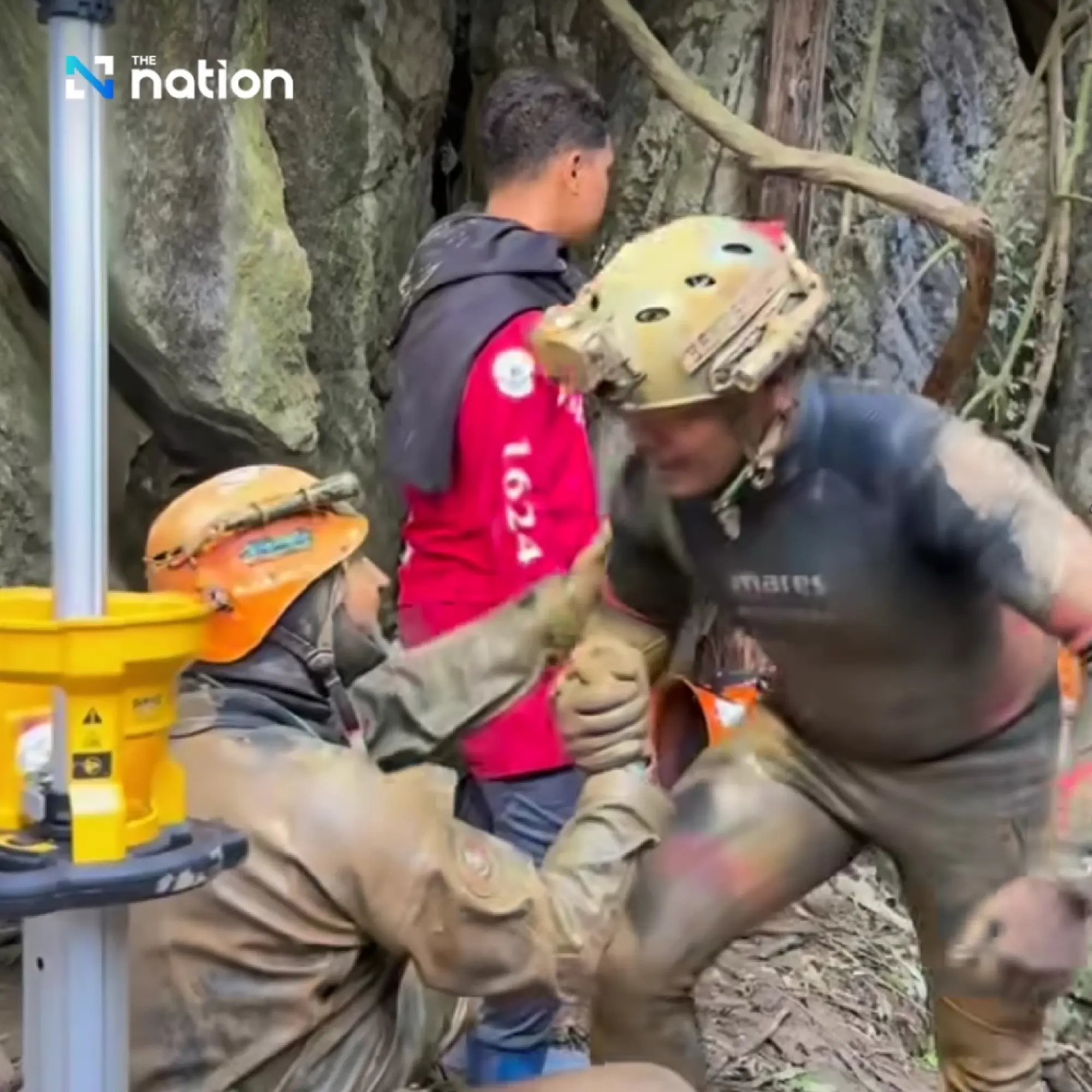Thai rescuers find five alive in flooded Laos cave, with two still missing