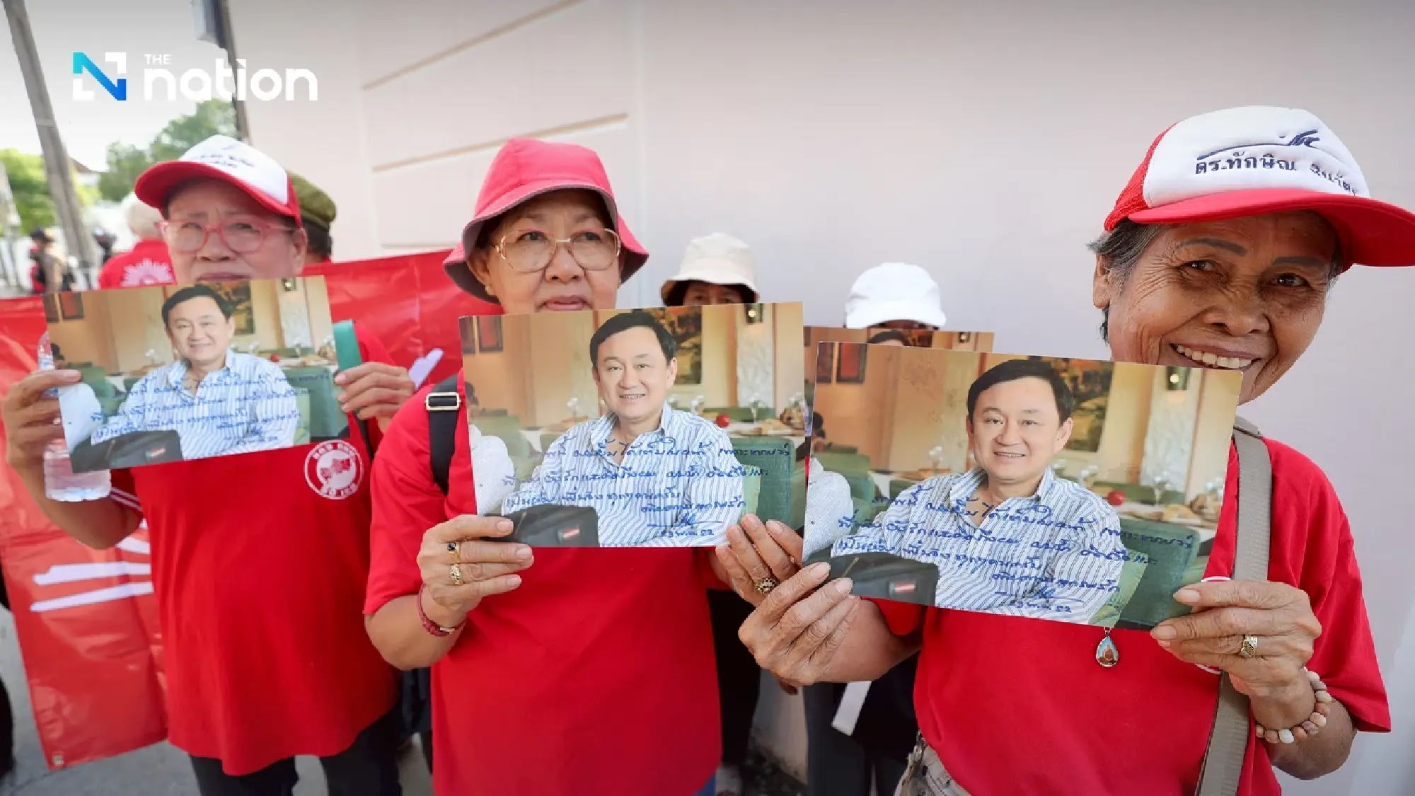 Thaksin returns home after parole as PM says he is ‘glad’