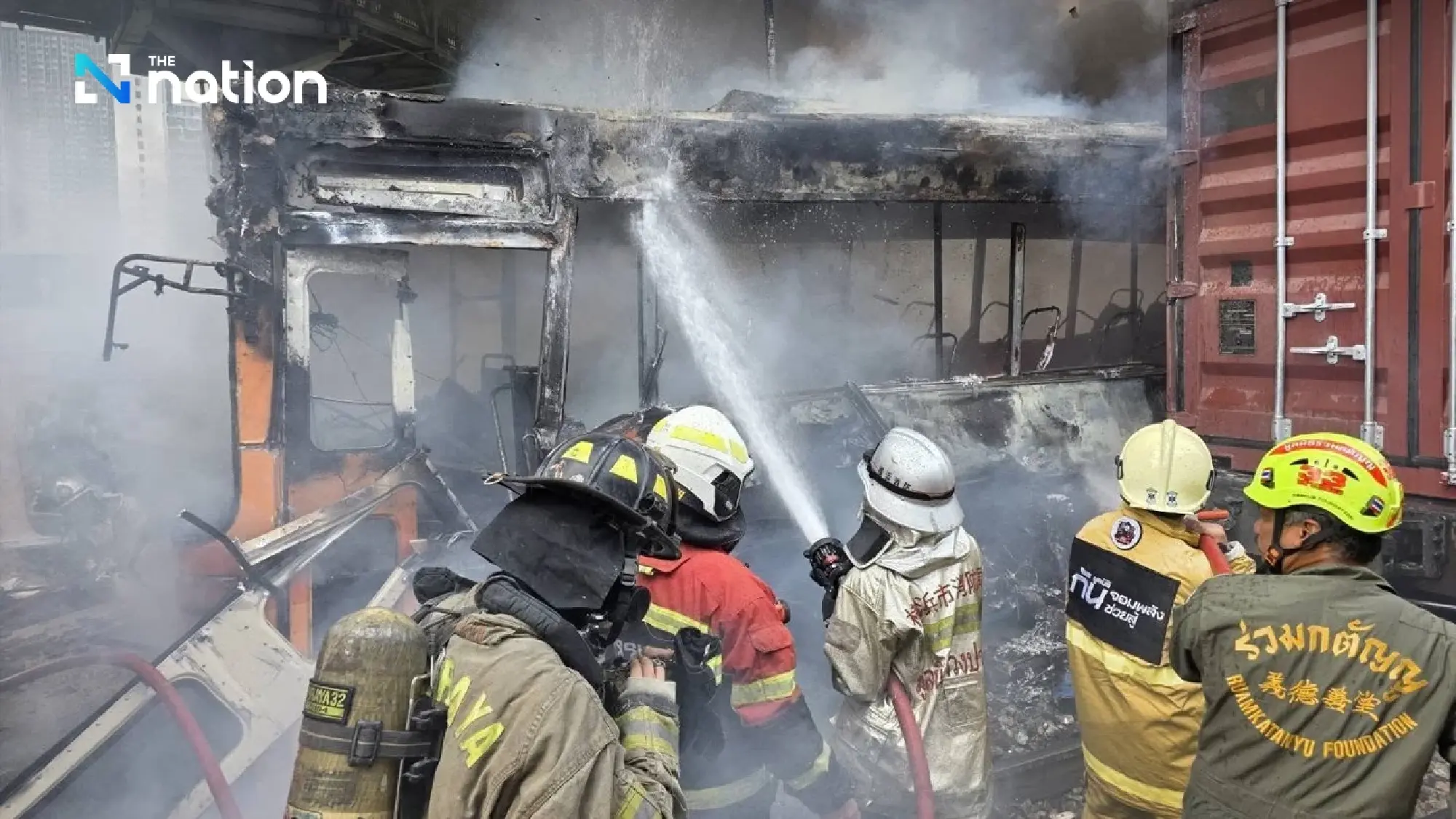 Eight found dead after freight train hits Bangkok bus near Makkasan