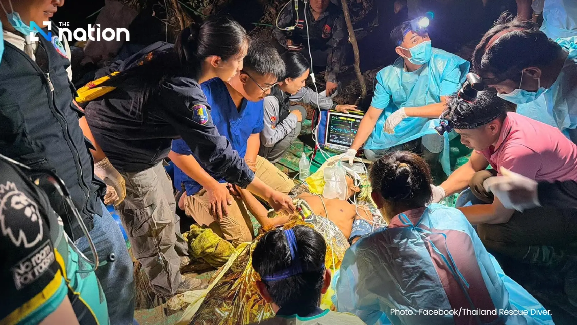 Rescuers bring first Lao worker to safety from flooded cave