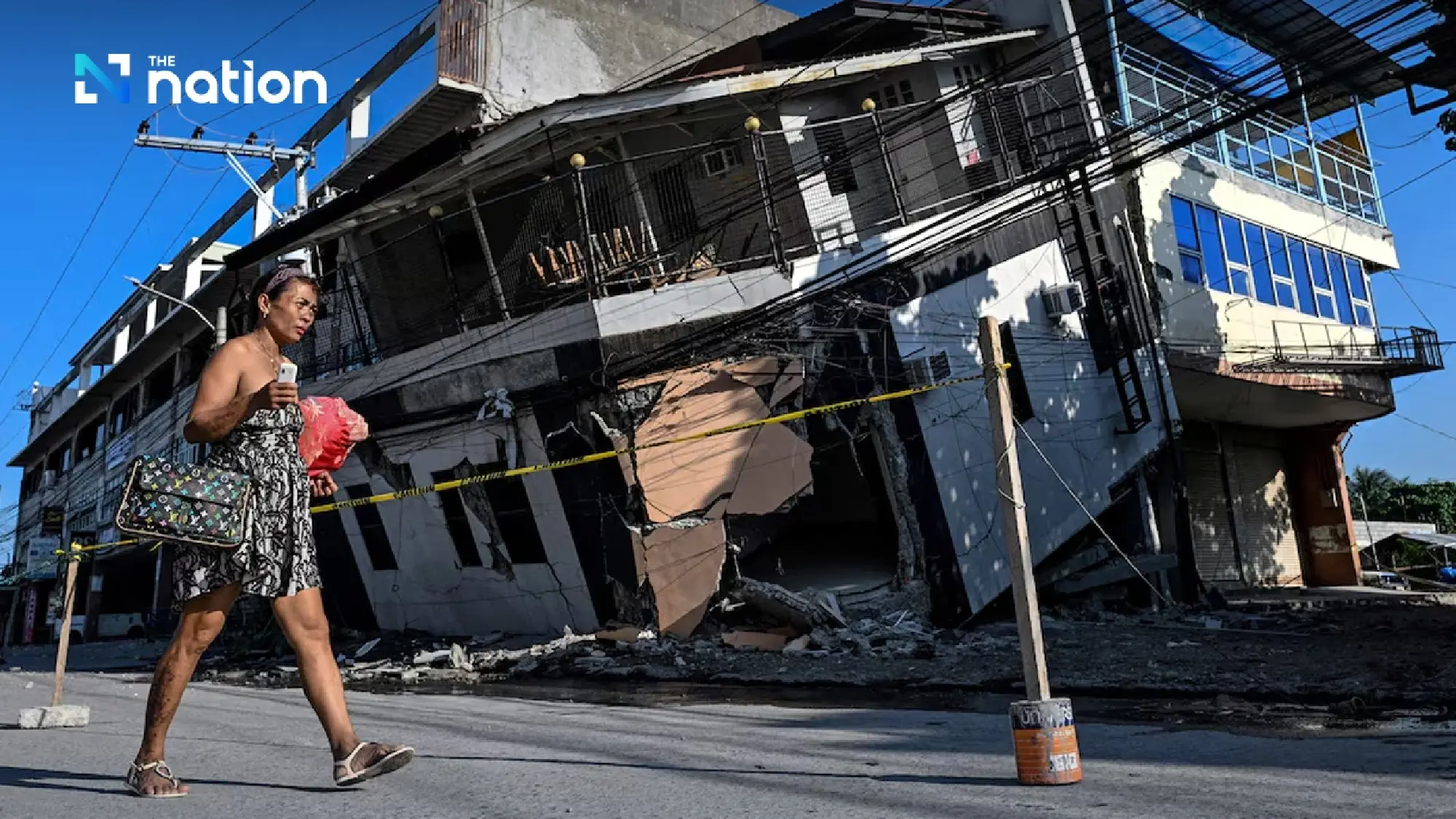 Philippines quake toll reaches 37 as rescuers search collapsed building