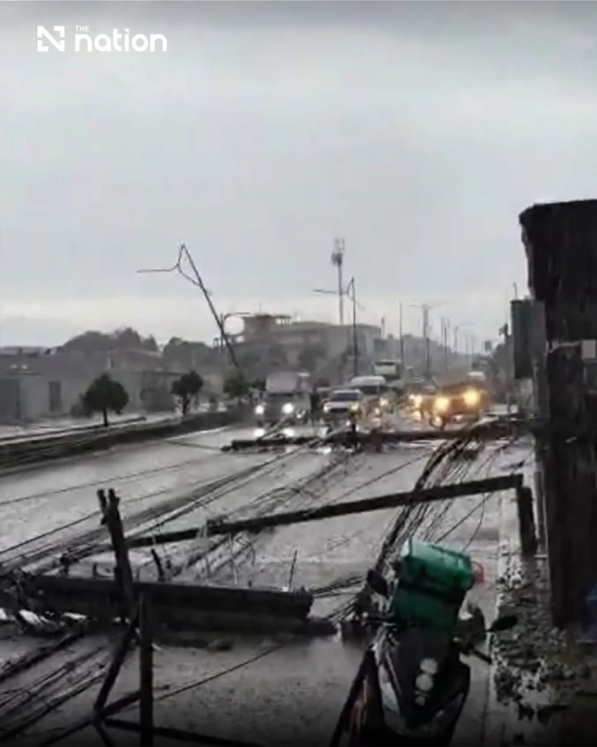 Electricity poles collapse onto cars in Bangkok’s Lat Krabang amid heavy rain