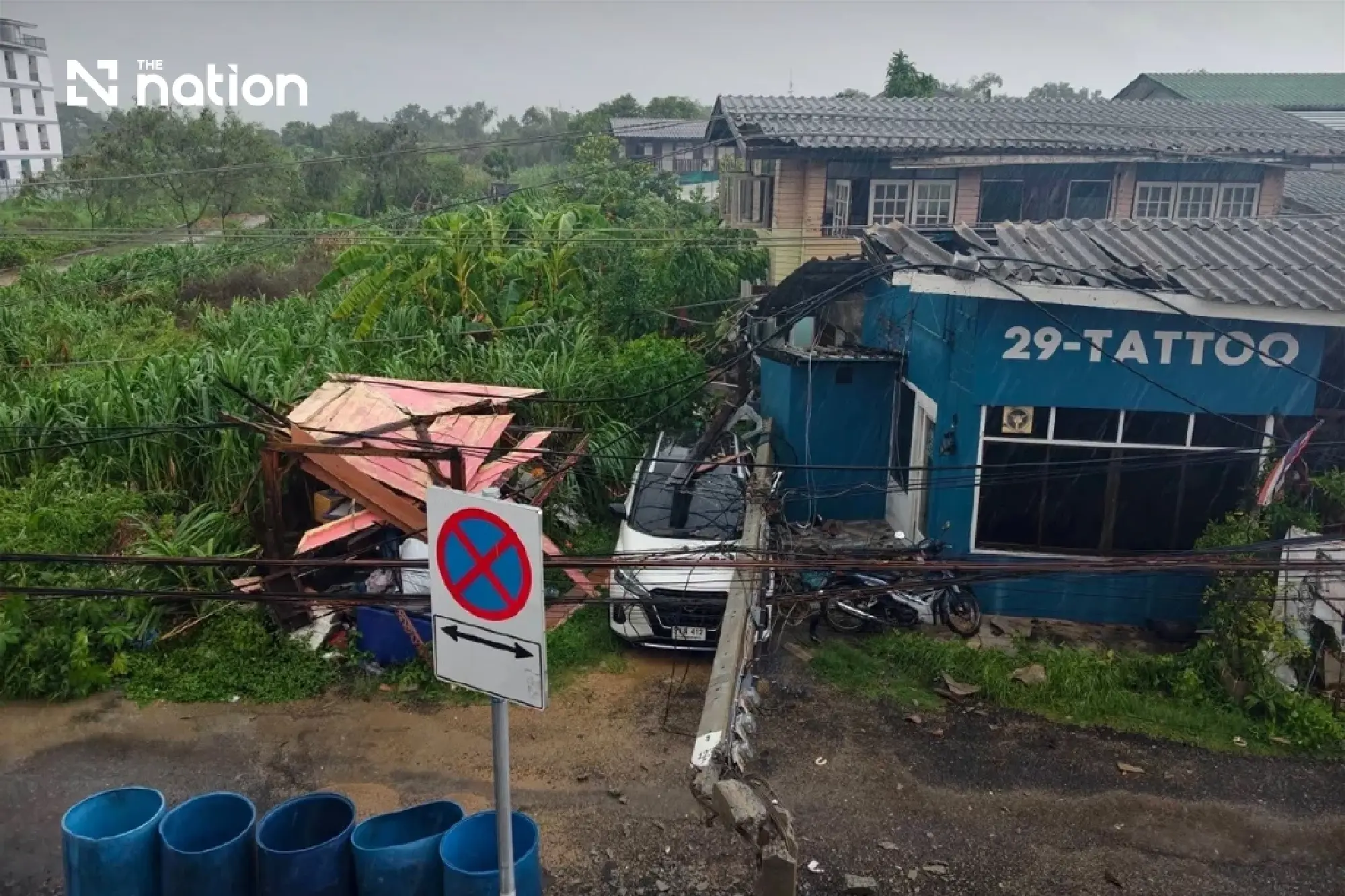 Electricity poles collapse onto cars in Bangkok’s Lat Krabang amid heavy rain